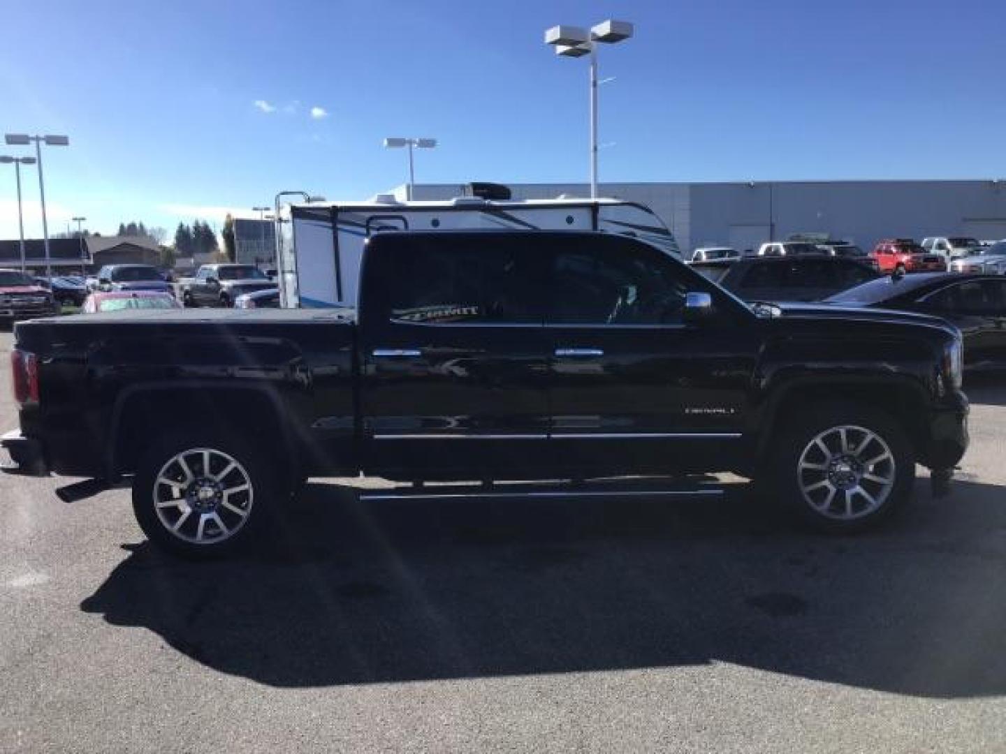 2018 Onyx Black /Cocoa/Dark Sand, leather GMC Sierra 1500 Denali Crew Cab Short Box 4WD (3GTU2PEJ0JG) with an 6.2L V8 OHV 16V engine, 6-Speed Automatic transmission, located at 1235 N Woodruff Ave., Idaho Falls, 83401, (208) 523-1053, 43.507172, -112.000488 - This 2018 GMC 1500 Denali has the 6.2L motor. It has 84,620. This is a really nice truck, that is loaded up with options. At Timberline Auto it is always easy to find a great deal on your next vehicle! Our experienced sales staff can help find the right vehicle that will fit your needs. Our knowledg - Photo#5