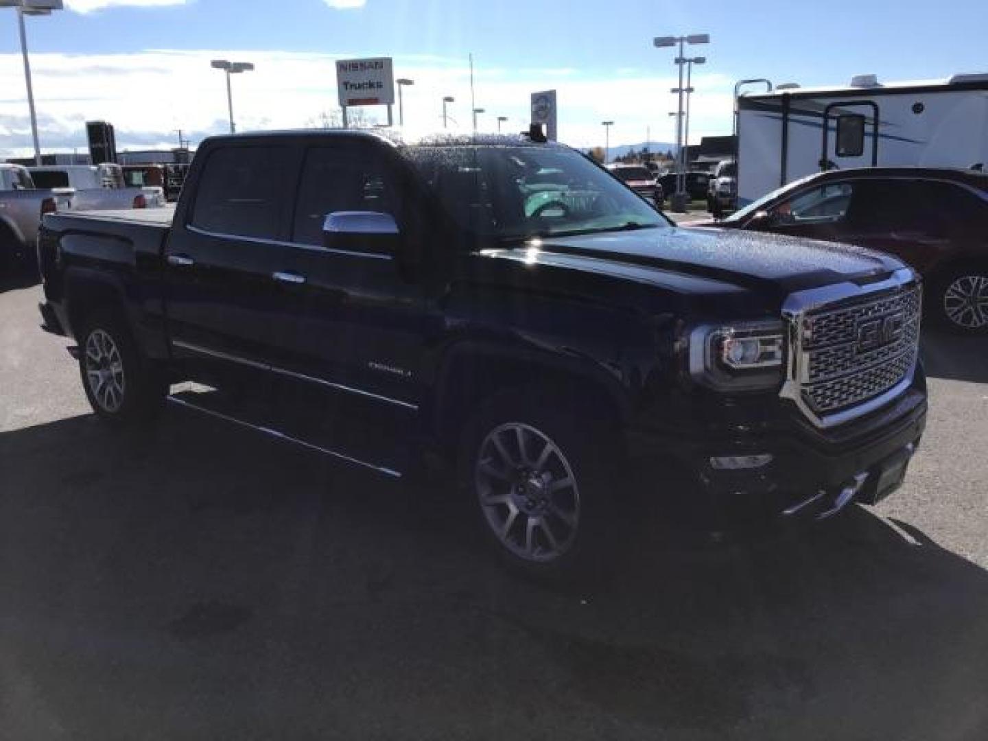 2018 Onyx Black /Cocoa/Dark Sand, leather GMC Sierra 1500 Denali Crew Cab Short Box 4WD (3GTU2PEJ0JG) with an 6.2L V8 OHV 16V engine, 6-Speed Automatic transmission, located at 1235 N Woodruff Ave., Idaho Falls, 83401, (208) 523-1053, 43.507172, -112.000488 - This 2018 GMC 1500 Denali has the 6.2L motor. It has 84,620. This is a really nice truck, that is loaded up with options. At Timberline Auto it is always easy to find a great deal on your next vehicle! Our experienced sales staff can help find the right vehicle that will fit your needs. Our knowledg - Photo#6