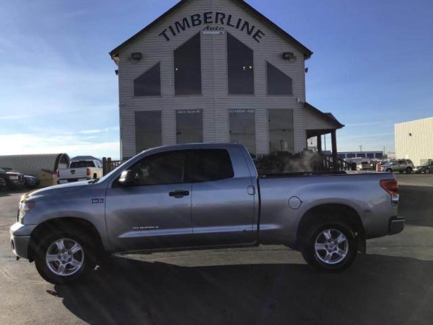 2008 Silver Sky Metallic /Graphite Cloth Interior Toyota Tundra SR5 Double Cab 5.7L 4WD (5TFBV54138X) with an 5.7L V8 DOHC 32V engine, 6-Speed Automatic transmission, located at 1235 N Woodruff Ave., Idaho Falls, 83401, (208) 523-1053, 43.507172, -112.000488 - This 2008 Toyota Tundra 4x4 , has the 5.7L V8 motor. It only has 121,145 miles. It comes with cloth interior, bench seat, in the front, for extra seating. It comes with cruise control, and AM/FM CD stereo. At Timberline Auto it is always easy to find a great deal on your next vehicle! Our experience - Photo#1