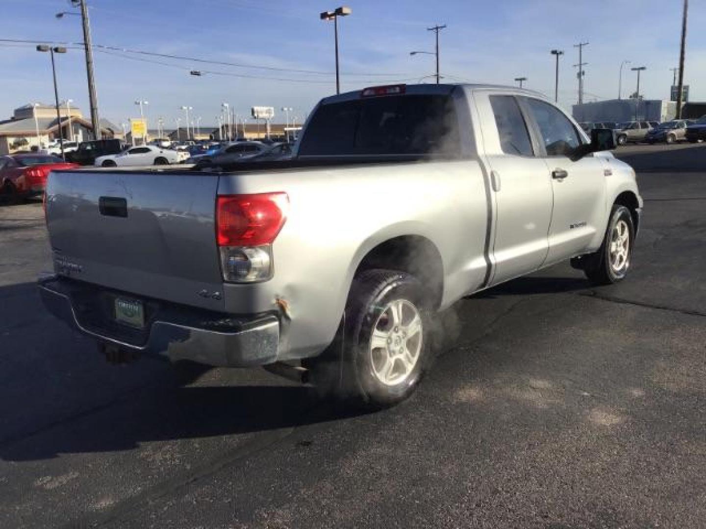 2008 Silver Sky Metallic /Graphite Cloth Interior Toyota Tundra SR5 Double Cab 5.7L 4WD (5TFBV54138X) with an 5.7L V8 DOHC 32V engine, 6-Speed Automatic transmission, located at 1235 N Woodruff Ave., Idaho Falls, 83401, (208) 523-1053, 43.507172, -112.000488 - This 2008 Toyota Tundra 4x4 , has the 5.7L V8 motor. It only has 121,145 miles. It comes with cloth interior, bench seat, in the front, for extra seating. It comes with cruise control, and AM/FM CD stereo. At Timberline Auto it is always easy to find a great deal on your next vehicle! Our experience - Photo#4