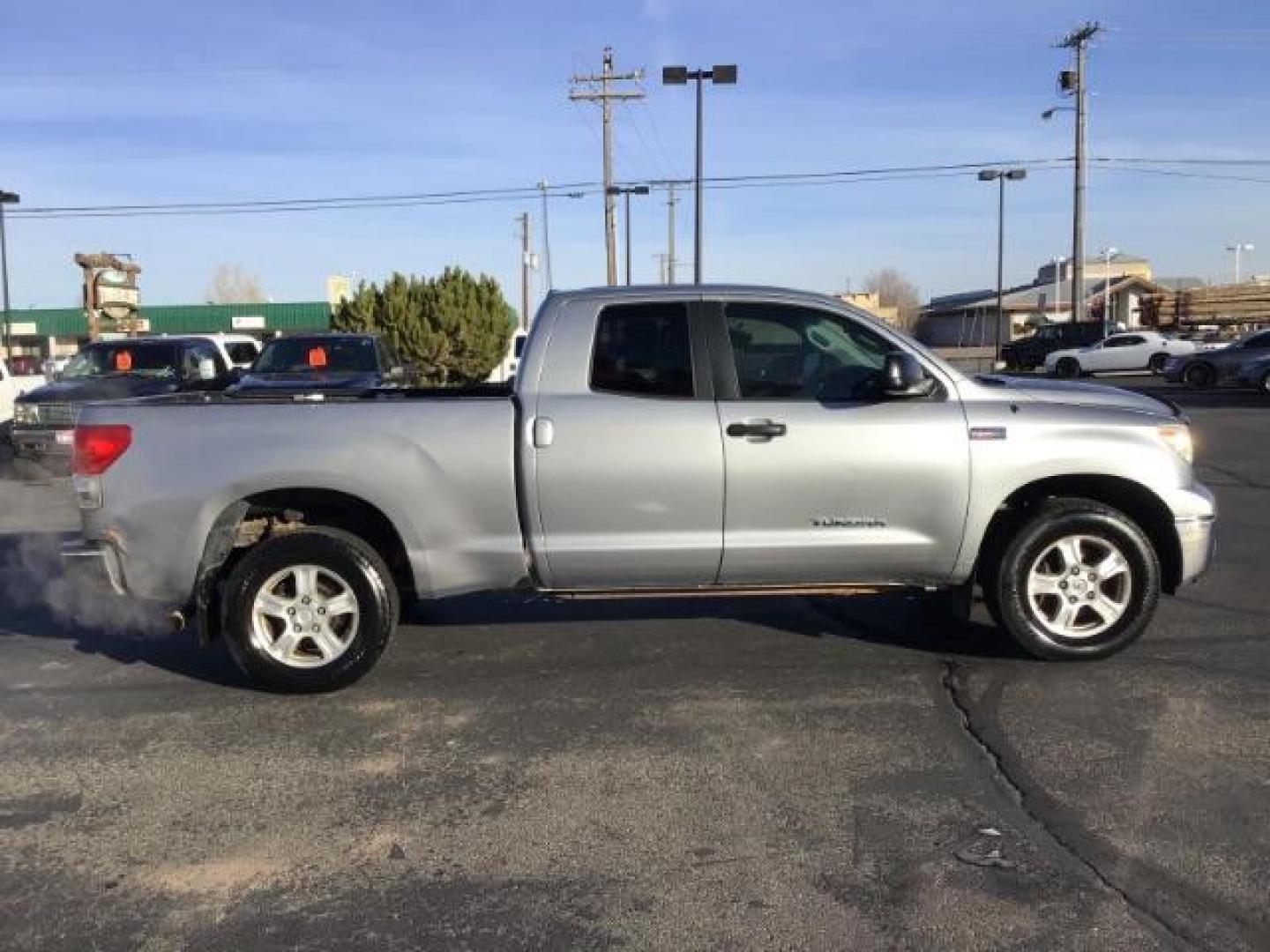 2008 Silver Sky Metallic /Graphite Cloth Interior Toyota Tundra SR5 Double Cab 5.7L 4WD (5TFBV54138X) with an 5.7L V8 DOHC 32V engine, 6-Speed Automatic transmission, located at 1235 N Woodruff Ave., Idaho Falls, 83401, (208) 523-1053, 43.507172, -112.000488 - This 2008 Toyota Tundra 4x4 , has the 5.7L V8 motor. It only has 121,145 miles. It comes with cloth interior, bench seat, in the front, for extra seating. It comes with cruise control, and AM/FM CD stereo. At Timberline Auto it is always easy to find a great deal on your next vehicle! Our experience - Photo#5