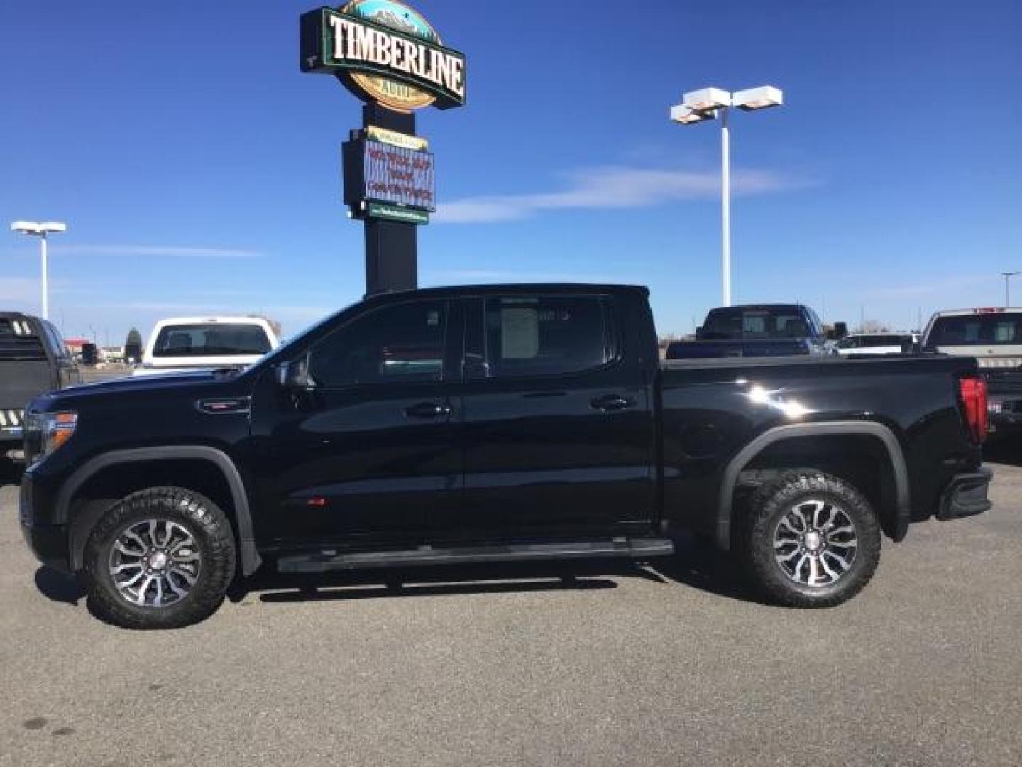 2020 Carbon Black Metallic /Jet Black w/Kalahari Accents, leather GMC Sierra 1500 AT4 Crew Cab Short Box 4WD (1GTP9EEL2LZ) with an 6.2L V8 OHV 16V engine, 6-Speed Automatic transmission, located at 1235 N Woodruff Ave., Idaho Falls, 83401, (208) 523-1053, 43.507172, -112.000488 - This 2020 GMC Sierra AT4, only has 46,417 miles. It comes with leather interior, heated and cooled seats, heads up display, sunroof, integrated trailer brake, and bluetooth. At Timberline Auto it is always easy to find a great deal on your next vehicle! Our experienced sales staff can help find the - Photo#1