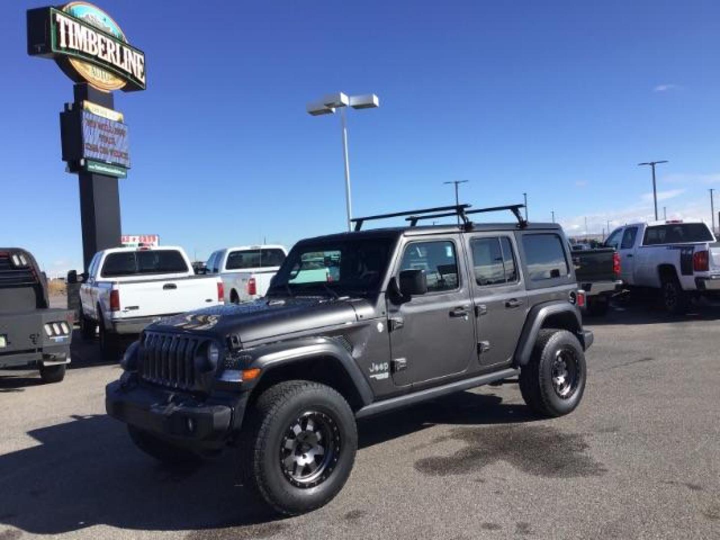 2018 GRAY /CLOTH Jeep Wrangler Unlimited Sport (1C4HJXDG9JW) with an 3.6L V6 DOHC 24V FFV engine, 6-Speed Automatic transmission, located at 1235 N Woodruff Ave., Idaho Falls, 83401, (208) 523-1053, 43.507172, -112.000488 - This 2018 Jeep Wrangler Sport, has the 3.6L V6 motor. It has 120,819 miles. This is a really nice Jeep that has 4x4, keyless remote, bluetooth, power locks and doors. Also comes with Alpine premium sound. At Timberline Auto it is always easy to find a great deal on your next vehicle! Our experienced - Photo#0