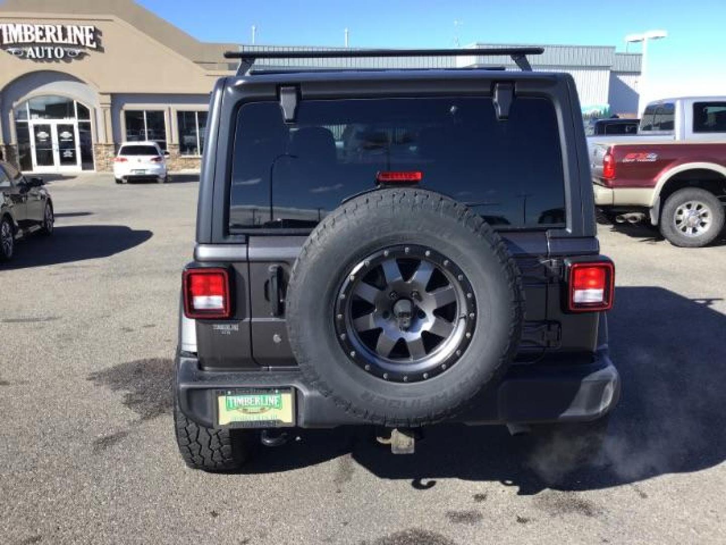 2018 GRAY /CLOTH Jeep Wrangler Unlimited Sport (1C4HJXDG9JW) with an 3.6L V6 DOHC 24V FFV engine, 6-Speed Automatic transmission, located at 1235 N Woodruff Ave., Idaho Falls, 83401, (208) 523-1053, 43.507172, -112.000488 - This 2018 Jeep Wrangler Sport, has the 3.6L V6 motor. It has 120,819 miles. This is a really nice Jeep that has 4x4, keyless remote, bluetooth, power locks and doors. Also comes with Alpine premium sound. At Timberline Auto it is always easy to find a great deal on your next vehicle! Our experienced - Photo#3