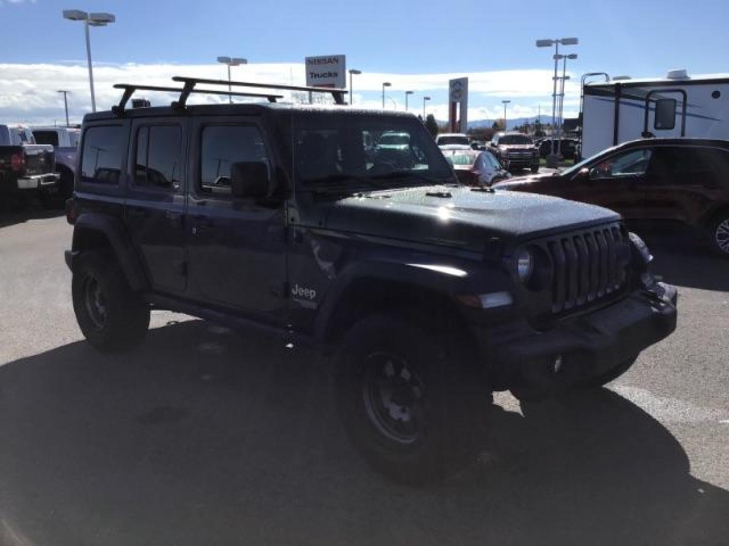 2018 GRAY /CLOTH Jeep Wrangler Unlimited Sport (1C4HJXDG9JW) with an 3.6L V6 DOHC 24V FFV engine, 6-Speed Automatic transmission, located at 1235 N Woodruff Ave., Idaho Falls, 83401, (208) 523-1053, 43.507172, -112.000488 - This 2018 Jeep Wrangler Sport, has the 3.6L V6 motor. It has 120,819 miles. This is a really nice Jeep that has 4x4, keyless remote, bluetooth, power locks and doors. Also comes with Alpine premium sound. At Timberline Auto it is always easy to find a great deal on your next vehicle! Our experienced - Photo#6