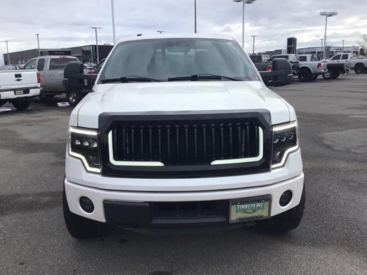 2014 White Platinum Met TC /Black Ford F-150 Platinum SuperCrew 6.5-ft. Bed 4WD (1FTFW1ET2EF) with an 3.5L V6 TURBO engine, 6-Speed Automatic transmission, located at 1235 N Woodruff Ave., Idaho Falls, 83401, (208) 523-1053, 43.507172, -112.000488 - This 2014 Ford F150 Limited, has the 3.5L Ecoboost motor. It has 86,000 miles. It comes with leather interior, heated and cooled seats, dual power seats, back up camera, sunroof, and remote start. At Timberline Auto it is always easy to find a great deal on your next vehicle! Our experienced sales s - Photo#6