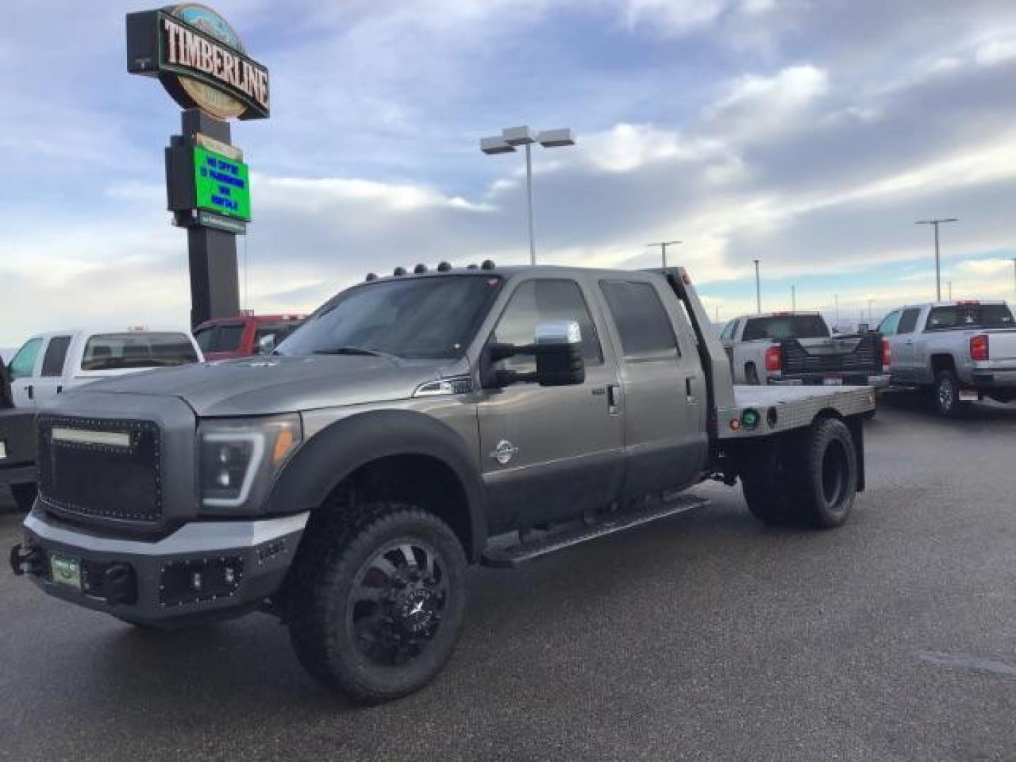 2013 GRAY /Black Leather Interior Ford F-450 SD Lariat Crew Cab DRW 4WD (1FT8W4DT1DE) with an 6.7L V8 OHV 16V DIESEL engine, 6-Speed Automatic transmission, located at 1235 N Woodruff Ave., Idaho Falls, 83401, (208) 523-1053, 43.507172, -112.000488 - This 2013 Ford F450, has the 6.7L diesel motor. It has 223,337 miles. It has a flatbed, with turn over ball. The interior has leather seats, back up camera, heated seats, and power sunroof. At Timberline Auto it is always easy to find a great deal on your next vehicle! Our experienced sales staff ca - Photo#0