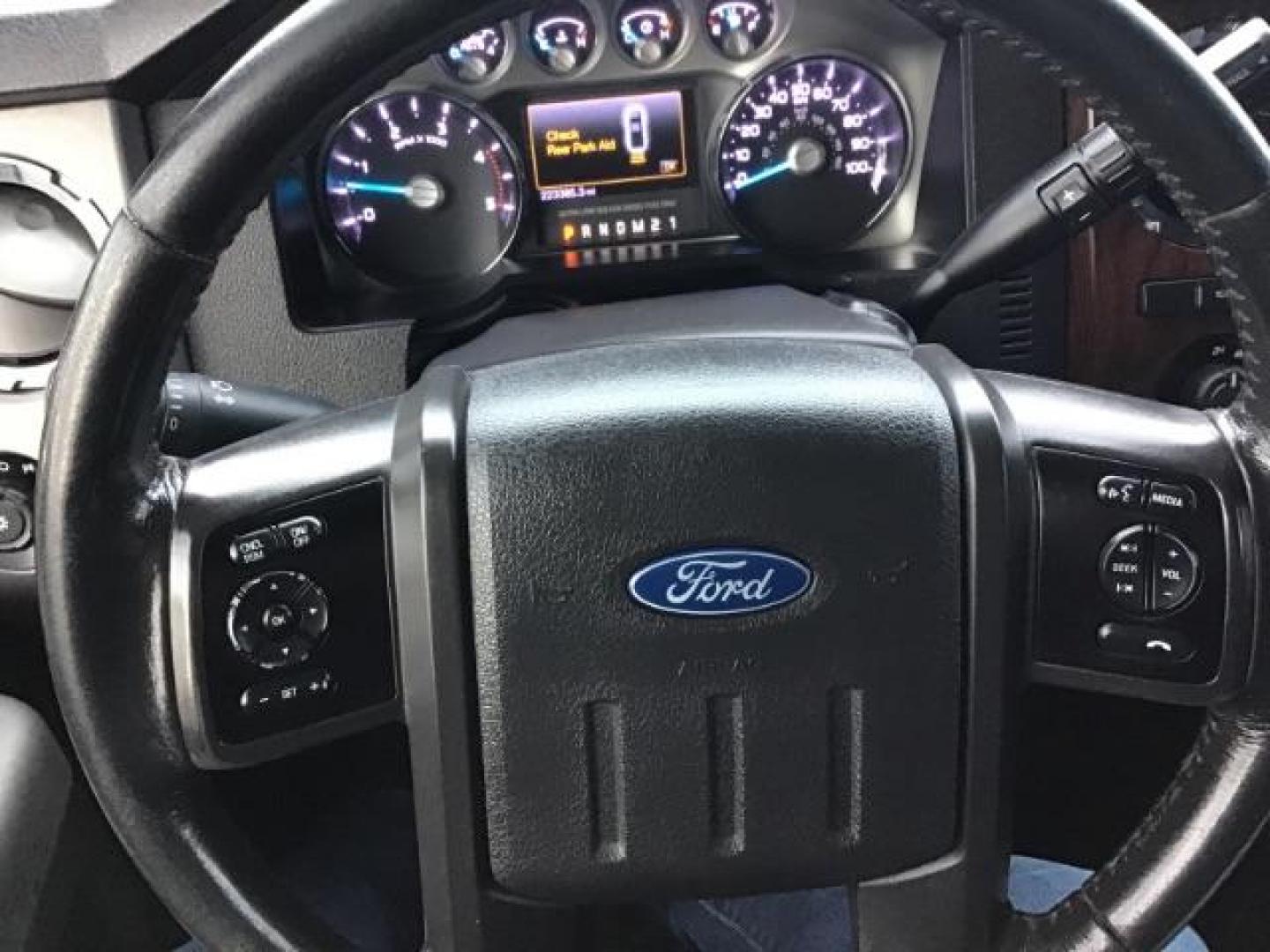 2013 GRAY /Black Leather Interior Ford F-450 SD Lariat Crew Cab DRW 4WD (1FT8W4DT1DE) with an 6.7L V8 OHV 16V DIESEL engine, 6-Speed Automatic transmission, located at 1235 N Woodruff Ave., Idaho Falls, 83401, (208) 523-1053, 43.507172, -112.000488 - This 2013 Ford F450, has the 6.7L diesel motor. It has 223,337 miles. It has a flatbed, with turn over ball. The interior has leather seats, back up camera, heated seats, and power sunroof. At Timberline Auto it is always easy to find a great deal on your next vehicle! Our experienced sales staff ca - Photo#12