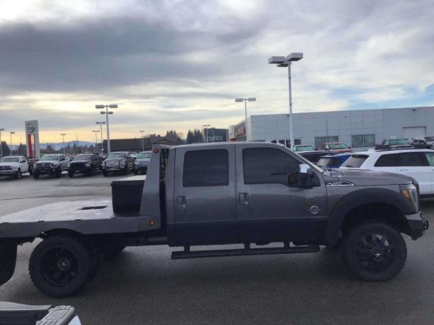 2013 GRAY /Black Leather Interior Ford F-450 SD Lariat Crew Cab DRW 4WD (1FT8W4DT1DE) with an 6.7L V8 OHV 16V DIESEL engine, 6-Speed Automatic transmission, located at 1235 N Woodruff Ave., Idaho Falls, 83401, (208) 523-1053, 43.507172, -112.000488 - This 2013 Ford F450, has the 6.7L diesel motor. It has 223,337 miles. It has a flatbed, with turn over ball. The interior has leather seats, back up camera, heated seats, and power sunroof. At Timberline Auto it is always easy to find a great deal on your next vehicle! Our experienced sales staff ca - Photo#4