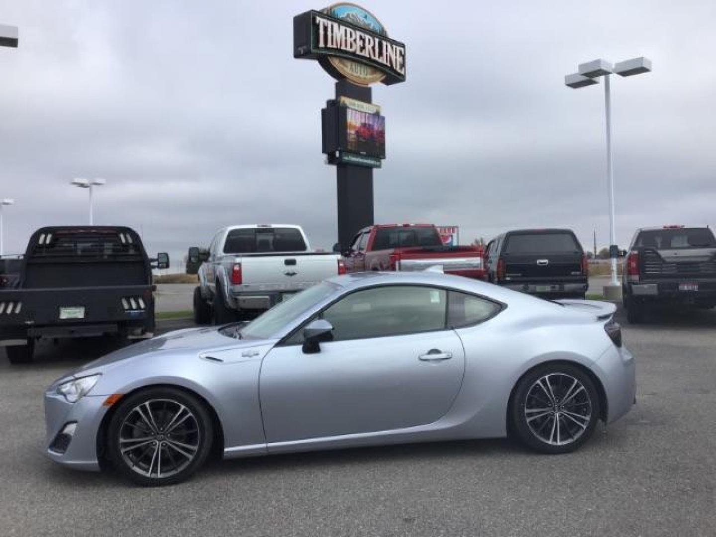 2015 Steel /Black Scion FR-S 6AT (JF1ZNAA15F8) with an 2.0L H4 16V engine, 6-Speed Automatic transmission, located at 1235 N Woodruff Ave., Idaho Falls, 83401, (208) 523-1053, 43.507172, -112.000488 - This 2015 Scion FRS, has a 2.0L 4cyl motor. It has 30,867 miles. It comes with paddle shifters, cloth interior, cruise control, and bluetooth. At Timberline Auto it is always easy to find a great deal on your next vehicle! Our experienced sales staff can help find the right vehicle that will fit you - Photo#1