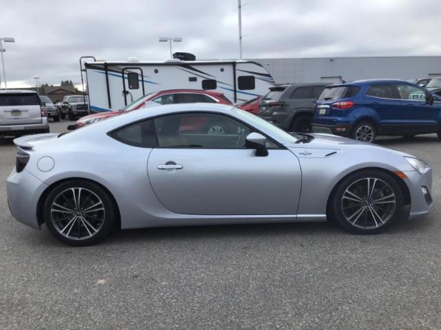 2015 Steel /Black Scion FR-S 6AT (JF1ZNAA15F8) with an 2.0L H4 16V engine, 6-Speed Automatic transmission, located at 1235 N Woodruff Ave., Idaho Falls, 83401, (208) 523-1053, 43.507172, -112.000488 - This 2015 Scion FRS, has a 2.0L 4cyl motor. It has 30,867 miles. It comes with paddle shifters, cloth interior, cruise control, and bluetooth. At Timberline Auto it is always easy to find a great deal on your next vehicle! Our experienced sales staff can help find the right vehicle that will fit you - Photo#5