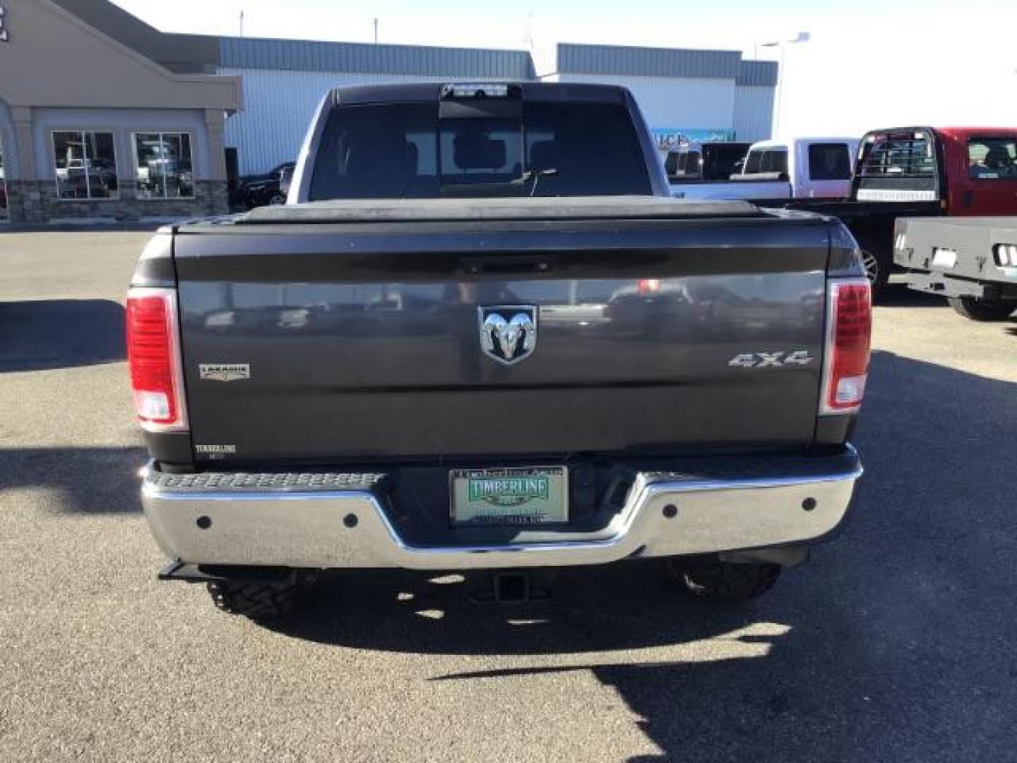 2015 GRAY /LEATHER RAM 2500 Laramie Mega Cab 4WD (3C6UR5NJ9FG) with an 6.4L V8 engine, 6-Speed Automatic transmission, located at 1235 N Woodruff Ave., Idaho Falls, 83401, (208) 523-1053, 43.507172, -112.000488 - This 2015 Ram 2500 Laramie, has the 6.4L V8 Hemi motor. It has 97,556 miles. It has the Mega Cab, and is loaded, with leather seats, keyless remote, power locks, dual power seats, back up camera, heated seats, and a soft tonneau cover. At Timberline Auto it is always easy to find a great deal on yo - Photo#3