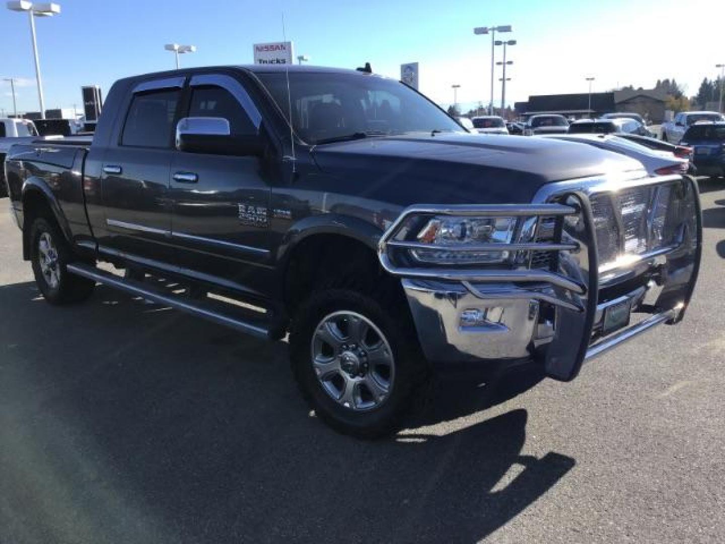 2015 GRAY /LEATHER RAM 2500 Laramie Mega Cab 4WD (3C6UR5NJ9FG) with an 6.4L V8 engine, 6-Speed Automatic transmission, located at 1235 N Woodruff Ave., Idaho Falls, 83401, (208) 523-1053, 43.507172, -112.000488 - This 2015 Ram 2500 Laramie, has the 6.4L V8 Hemi motor. It has 97,556 miles. It has the Mega Cab, and is loaded, with leather seats, keyless remote, power locks, dual power seats, back up camera, heated seats, and a soft tonneau cover. At Timberline Auto it is always easy to find a great deal on yo - Photo#6