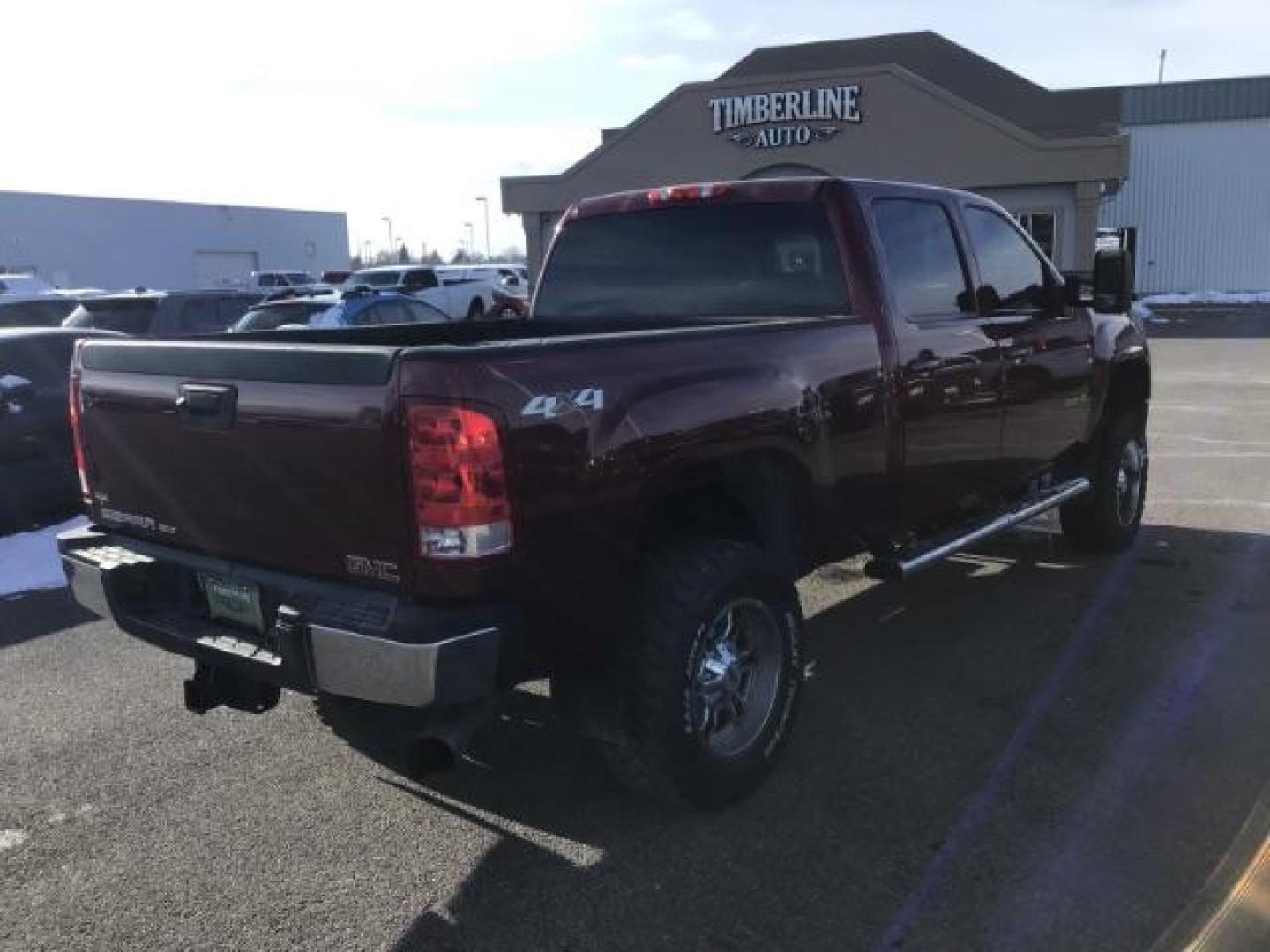 2013 Sonoma Red Metallic /Dark Titanium/Light Titanium Leather Interior GMC Sierra 2500HD SLT Crew Cab 4WD (1GT121C81DF) with an 6.6L V8 OHV 32V TURBO DIESEL engine, 6-Speed Automatic transmission, located at 1235 N Woodruff Ave., Idaho Falls, 83401, (208) 523-1053, 43.507172, -112.000488 - This 2013 GMC Sierra SLT 4x4, has the 6.6L duramax motor. It has 124,000 miles. Comes with leather interior, heated seats, blue tooth, dual power seats, key less remote, and turn over ball. At Timberline Auto it is always easy to find a great deal on your next vehicle! Our experienced sales staff ca - Photo#4