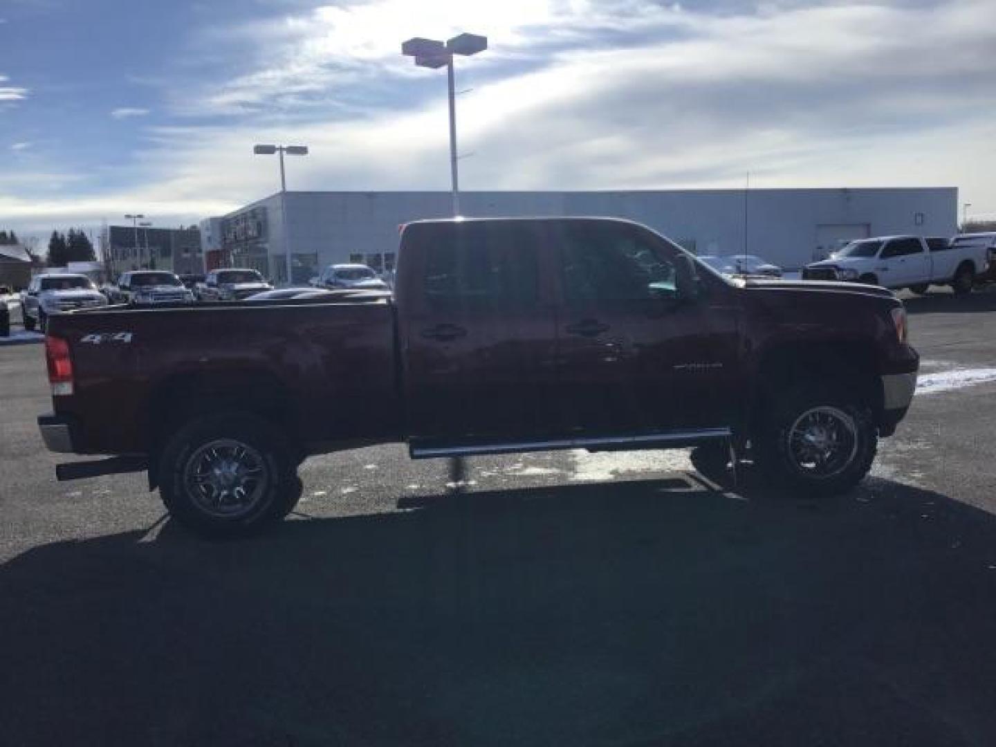 2013 Sonoma Red Metallic /Dark Titanium/Light Titanium Leather Interior GMC Sierra 2500HD SLT Crew Cab 4WD (1GT121C81DF) with an 6.6L V8 OHV 32V TURBO DIESEL engine, 6-Speed Automatic transmission, located at 1235 N Woodruff Ave., Idaho Falls, 83401, (208) 523-1053, 43.507172, -112.000488 - This 2013 GMC Sierra SLT 4x4, has the 6.6L duramax motor. It has 124,000 miles. Comes with leather interior, heated seats, blue tooth, dual power seats, key less remote, and turn over ball. At Timberline Auto it is always easy to find a great deal on your next vehicle! Our experienced sales staff ca - Photo#5