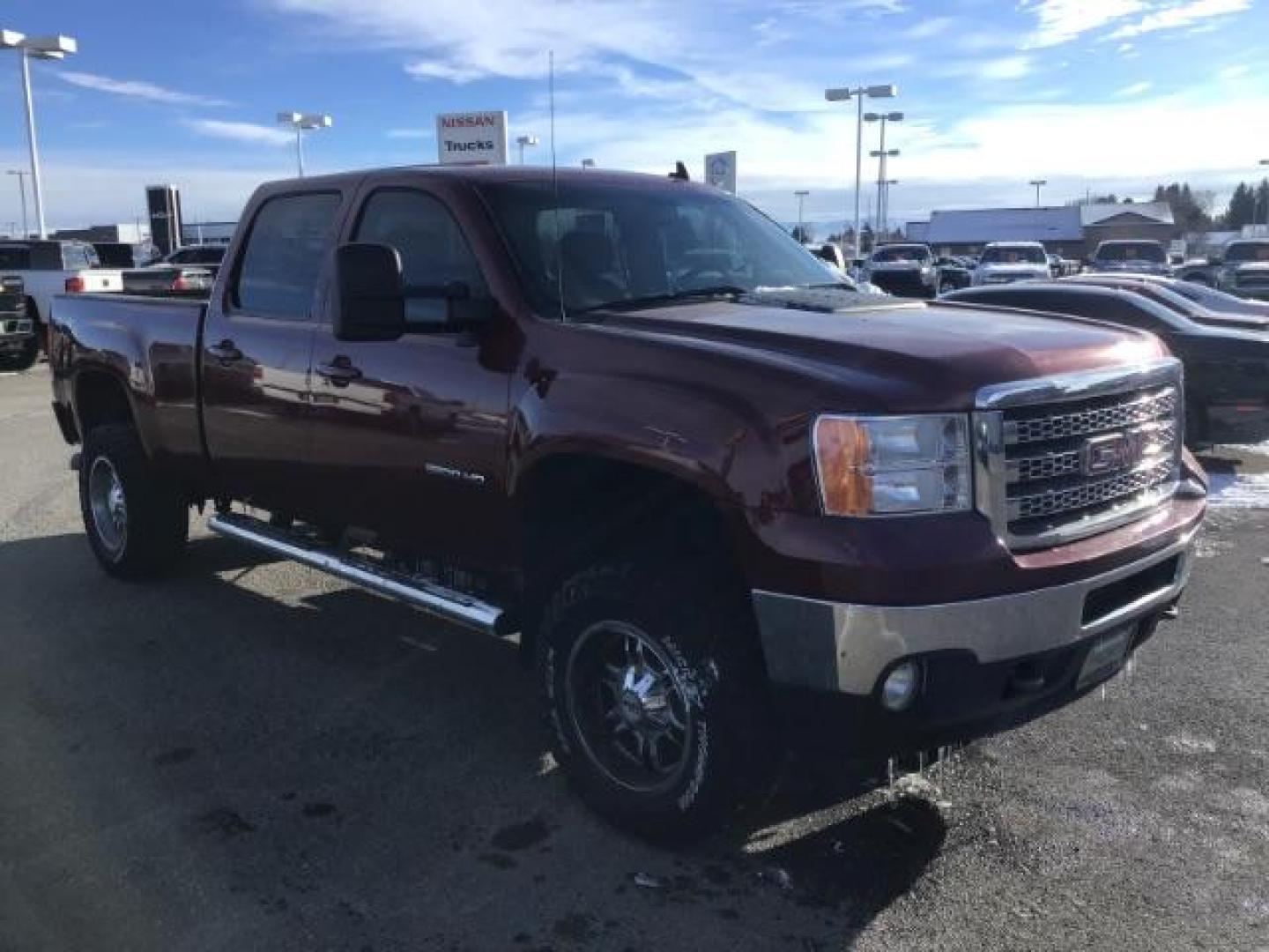 2013 Sonoma Red Metallic /Dark Titanium/Light Titanium Leather Interior GMC Sierra 2500HD SLT Crew Cab 4WD (1GT121C81DF) with an 6.6L V8 OHV 32V TURBO DIESEL engine, 6-Speed Automatic transmission, located at 1235 N Woodruff Ave., Idaho Falls, 83401, (208) 523-1053, 43.507172, -112.000488 - This 2013 GMC Sierra SLT 4x4, has the 6.6L duramax motor. It has 124,000 miles. Comes with leather interior, heated seats, blue tooth, dual power seats, key less remote, and turn over ball. At Timberline Auto it is always easy to find a great deal on your next vehicle! Our experienced sales staff ca - Photo#6