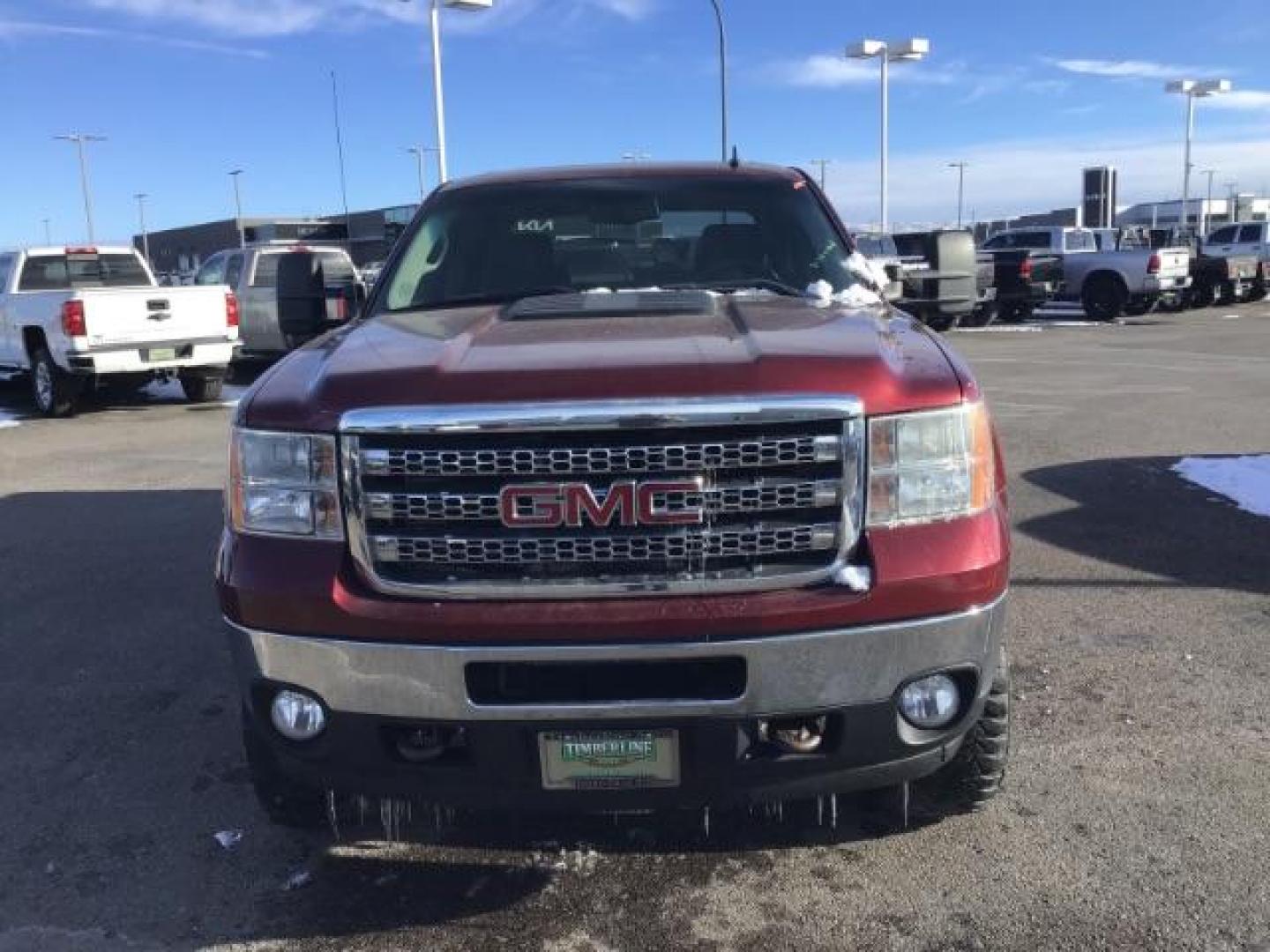 2013 Sonoma Red Metallic /Dark Titanium/Light Titanium Leather Interior GMC Sierra 2500HD SLT Crew Cab 4WD (1GT121C81DF) with an 6.6L V8 OHV 32V TURBO DIESEL engine, 6-Speed Automatic transmission, located at 1235 N Woodruff Ave., Idaho Falls, 83401, (208) 523-1053, 43.507172, -112.000488 - This 2013 GMC Sierra SLT 4x4, has the 6.6L duramax motor. It has 124,000 miles. Comes with leather interior, heated seats, blue tooth, dual power seats, key less remote, and turn over ball. At Timberline Auto it is always easy to find a great deal on your next vehicle! Our experienced sales staff ca - Photo#7