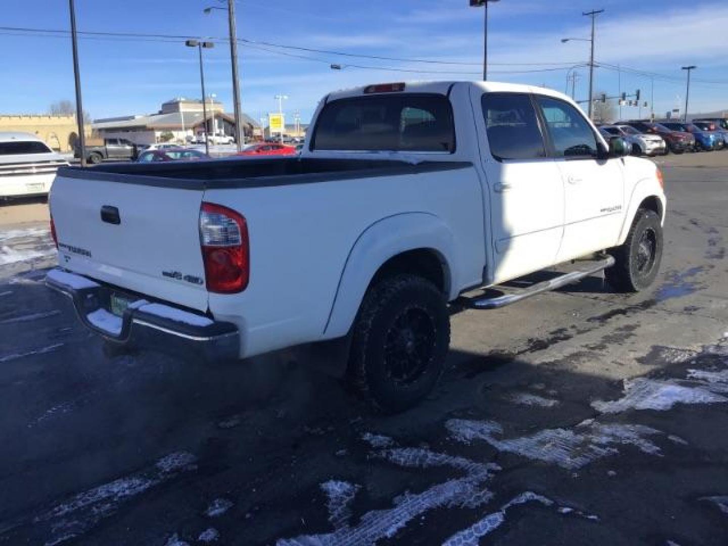 2004 Natural White /Gray Cloth Interior Toyota Tundra SR5 Double Cab 4WD (5TBDT44144S) with an 4.7L V8 DOHC 32V engine, 4-Speed Automatic transmission, located at 1235 N Woodruff Ave., Idaho Falls, 83401, (208) 523-1053, 43.507172, -112.000488 - This 2004 Toyota Tundra SR5 Double Cab 4WD, has cloth interior, cruise control, and AM/FM CD stereo. At Timberline Auto it is always easy to find a great deal on your next vehicle! Our experienced sales staff can help find the right vehicle will fit your needs. Our knowledgeable finance department h - Photo#4