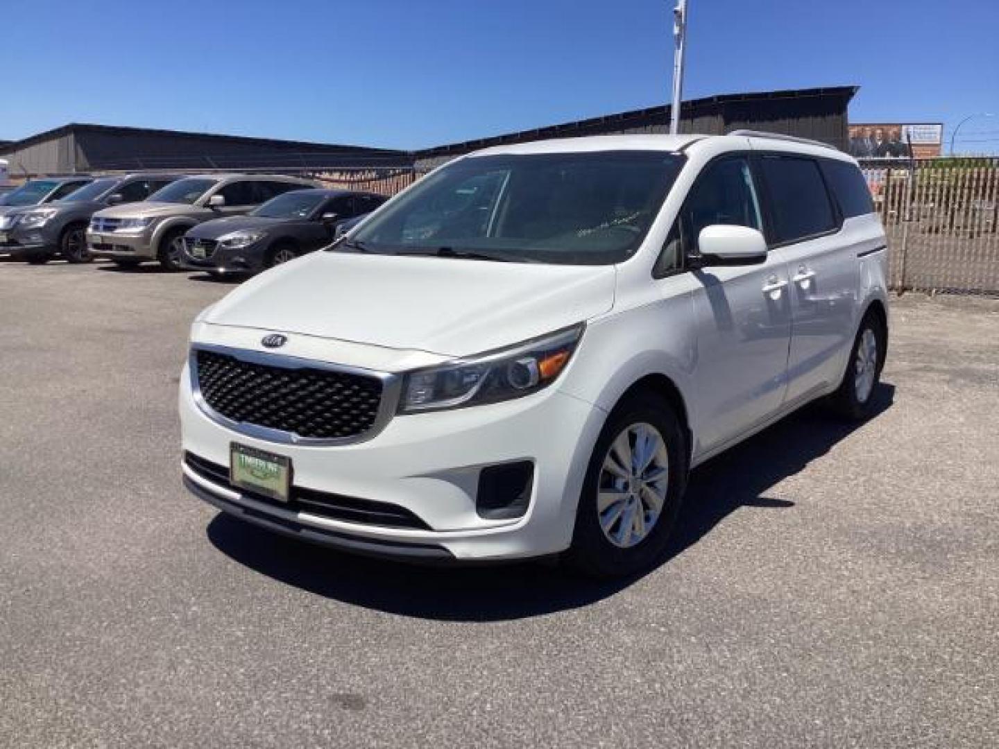 2015 Solid White /Gray, cloth Kia Sedona LX (KNDMB5C17F6) with an 3.3L V6 DOHC 24V engine, 6-Speed Automatic transmission, located at 1235 N Woodruff Ave., Idaho Falls, 83401, (208) 523-1053, 43.507172, -112.000488 - Photo#0