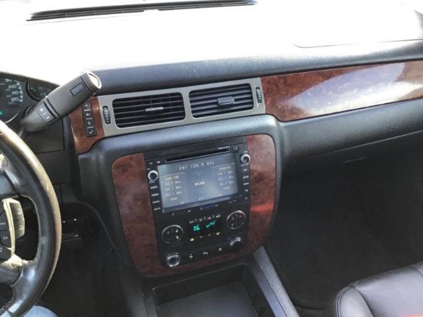 2009 Summit White /Light Titanium/Dark Titanium Cloth Interior Chevrolet Suburban LT1 1500 4WD (1GNFK26399R) with an 5.3L V8 OHV 16V FFV engine, 6-Speed Automatic transmission, located at 1235 N Woodruff Ave., Idaho Falls, 83401, (208) 523-1053, 43.507172, -112.000488 - This 2009 Chevrolet Suburban LT, has the 5.3L V8. It has leather interior, powered seats, cruise control, and 3rd row seating. At Timberline Auto it is always easy to find a great deal on your next vehicle! Our experienced sales staff can help find the right vehicle will fit your needs. Our knowledg - Photo#10