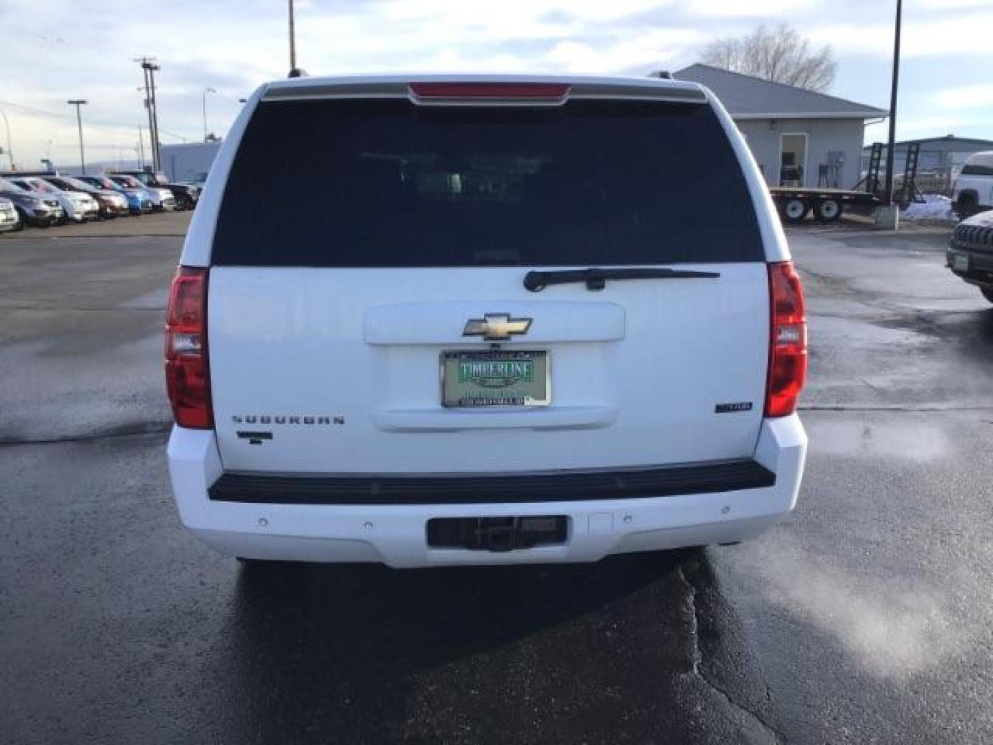 2009 Summit White /Light Titanium/Dark Titanium Cloth Interior Chevrolet Suburban LT1 1500 4WD (1GNFK26399R) with an 5.3L V8 OHV 16V FFV engine, 6-Speed Automatic transmission, located at 1235 N Woodruff Ave., Idaho Falls, 83401, (208) 523-1053, 43.507172, -112.000488 - This 2009 Chevrolet Suburban LT, has the 5.3L V8. It has leather interior, powered seats, cruise control, and 3rd row seating. At Timberline Auto it is always easy to find a great deal on your next vehicle! Our experienced sales staff can help find the right vehicle will fit your needs. Our knowledg - Photo#3