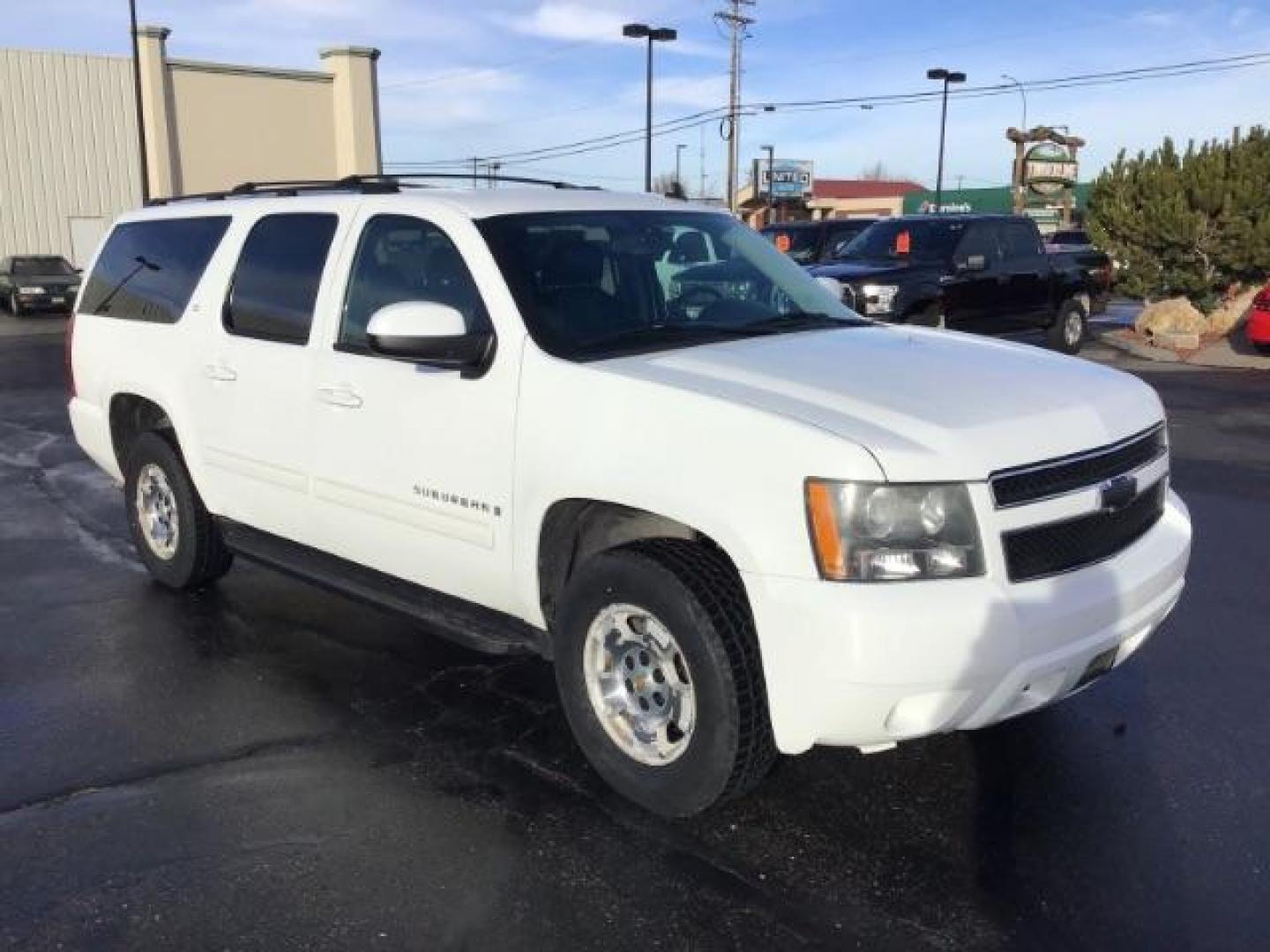 2009 Summit White /Light Titanium/Dark Titanium Cloth Interior Chevrolet Suburban LT1 1500 4WD (1GNFK26399R) with an 5.3L V8 OHV 16V FFV engine, 6-Speed Automatic transmission, located at 1235 N Woodruff Ave., Idaho Falls, 83401, (208) 523-1053, 43.507172, -112.000488 - This 2009 Chevrolet Suburban LT, has the 5.3L V8. It has leather interior, powered seats, cruise control, and 3rd row seating. At Timberline Auto it is always easy to find a great deal on your next vehicle! Our experienced sales staff can help find the right vehicle will fit your needs. Our knowledg - Photo#6