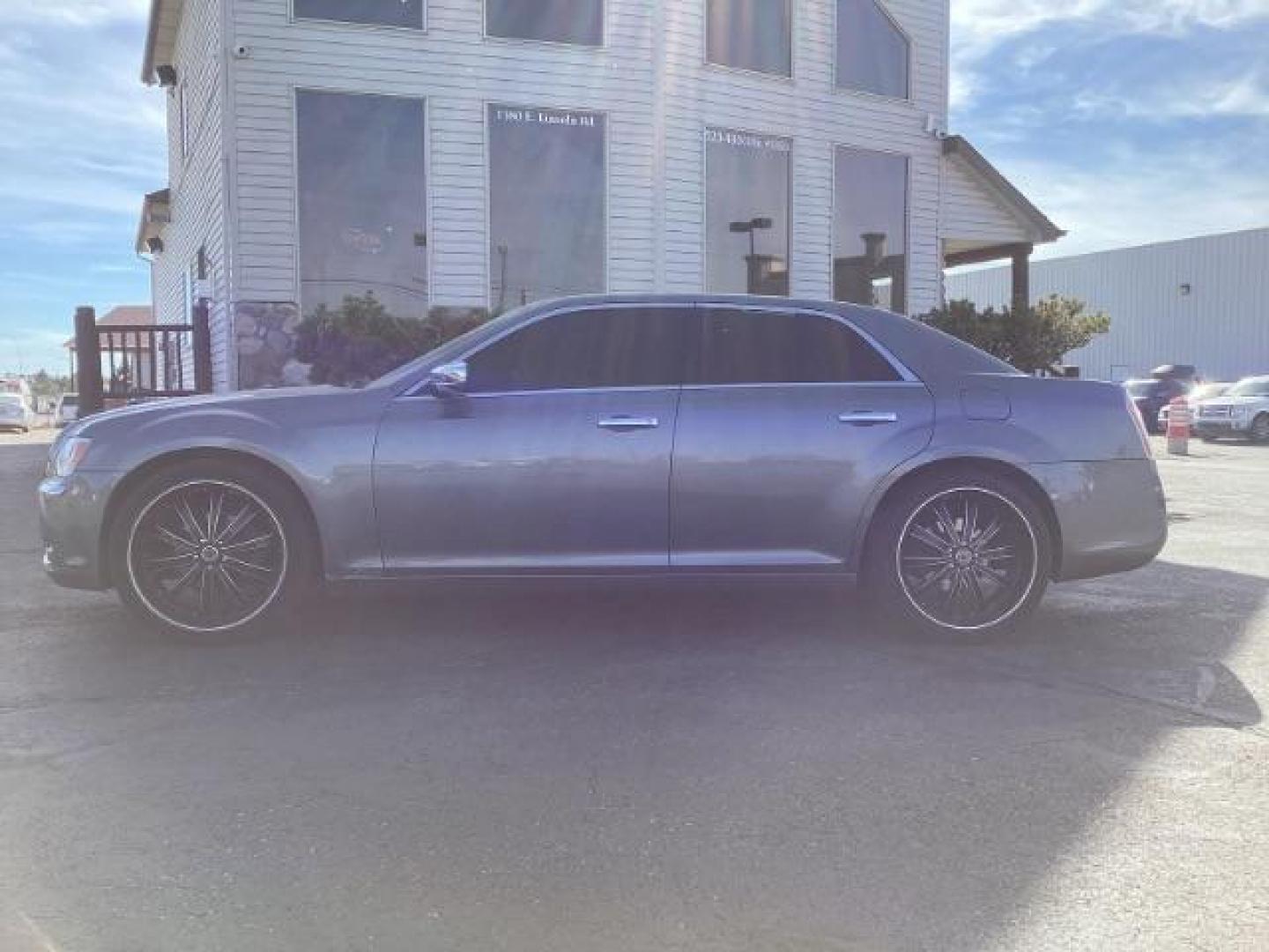 2012 Tungsten Metallic Chrysler 300 Limited RWD (2C3CCACG9CH) with an 3.6L V6 SOHC 24V engine, located at 1235 N Woodruff Ave., Idaho Falls, 83401, (208) 523-1053, 43.507172, -112.000488 - Photo#1