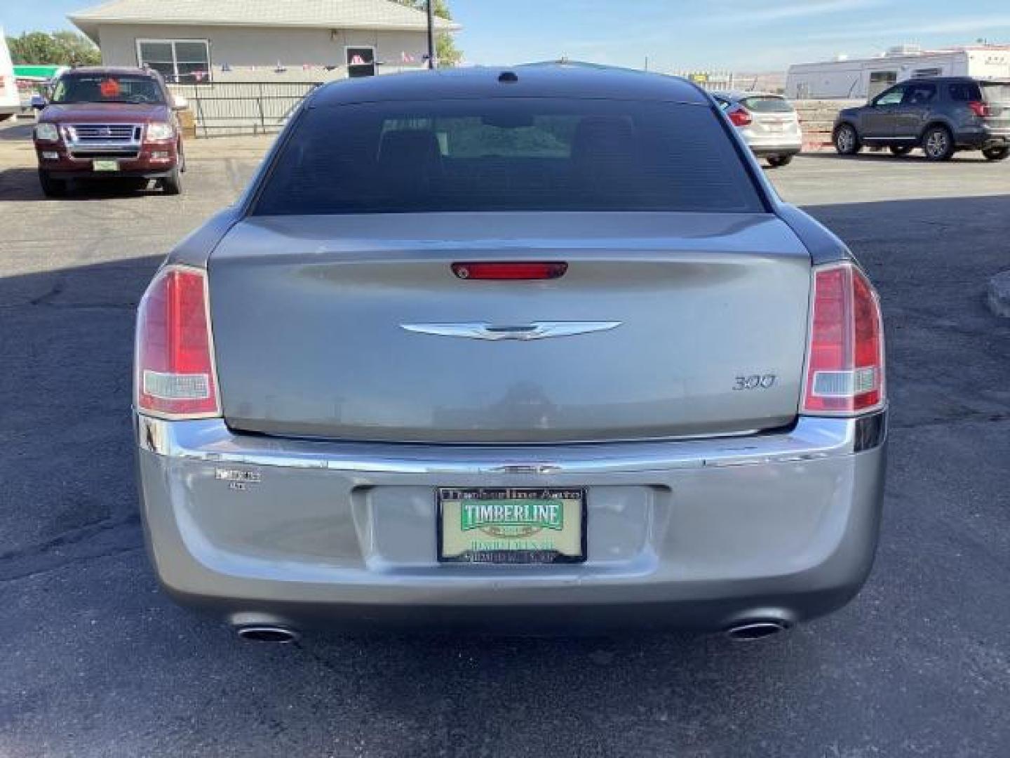 2012 Tungsten Metallic Chrysler 300 Limited RWD (2C3CCACG9CH) with an 3.6L V6 SOHC 24V engine, located at 1235 N Woodruff Ave., Idaho Falls, 83401, (208) 523-1053, 43.507172, -112.000488 - Photo#3