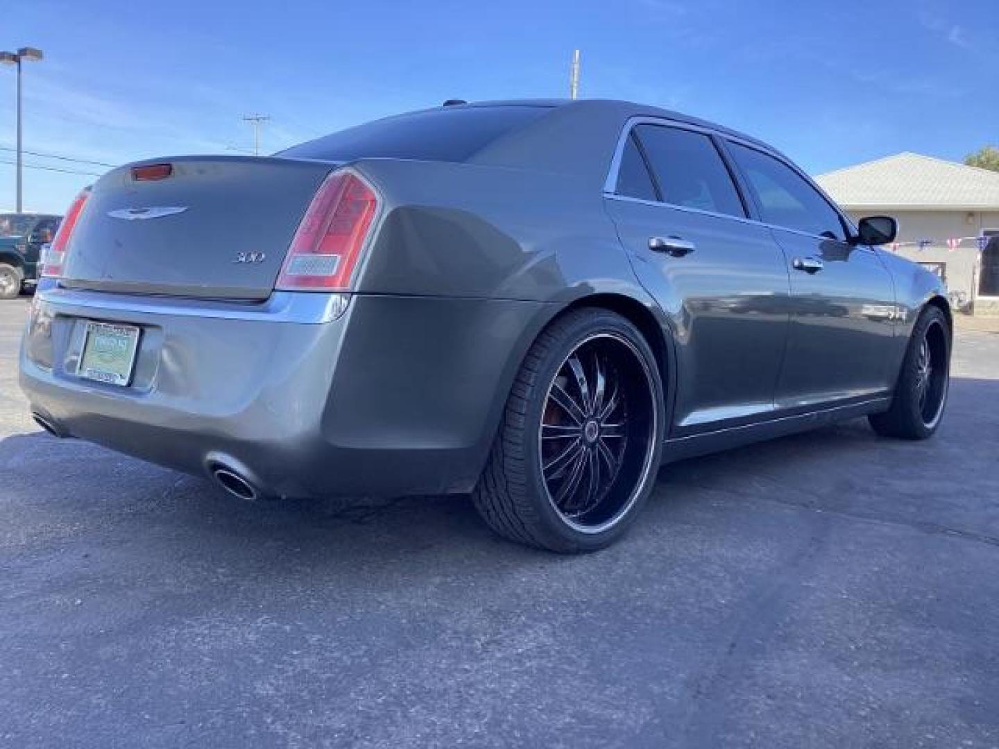 2012 Tungsten Metallic Chrysler 300 Limited RWD (2C3CCACG9CH) with an 3.6L V6 SOHC 24V engine, located at 1235 N Woodruff Ave., Idaho Falls, 83401, (208) 523-1053, 43.507172, -112.000488 - Photo#4