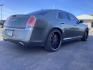 2012 Tungsten Metallic Chrysler 300 Limited RWD (2C3CCACG9CH) with an 3.6L V6 SOHC 24V engine, located at 1235 N Woodruff Ave., Idaho Falls, 83401, (208) 523-1053, 43.507172, -112.000488 - Photo#4