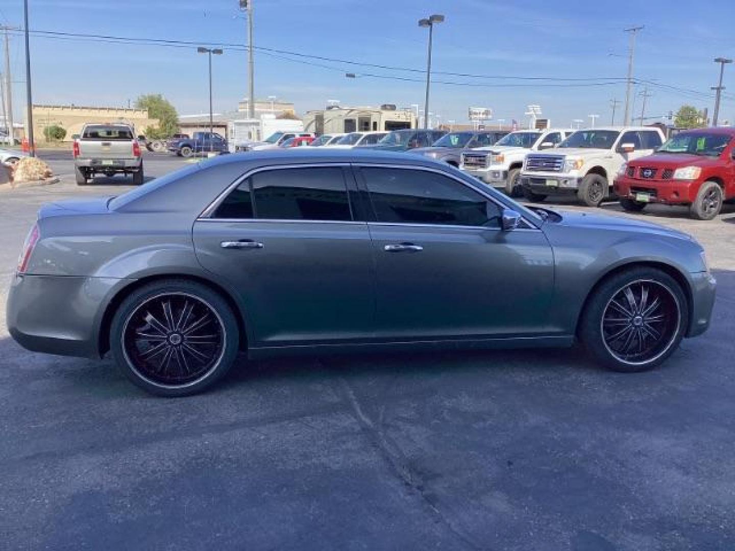 2012 Tungsten Metallic Chrysler 300 Limited RWD (2C3CCACG9CH) with an 3.6L V6 SOHC 24V engine, located at 1235 N Woodruff Ave., Idaho Falls, 83401, (208) 523-1053, 43.507172, -112.000488 - Photo#5