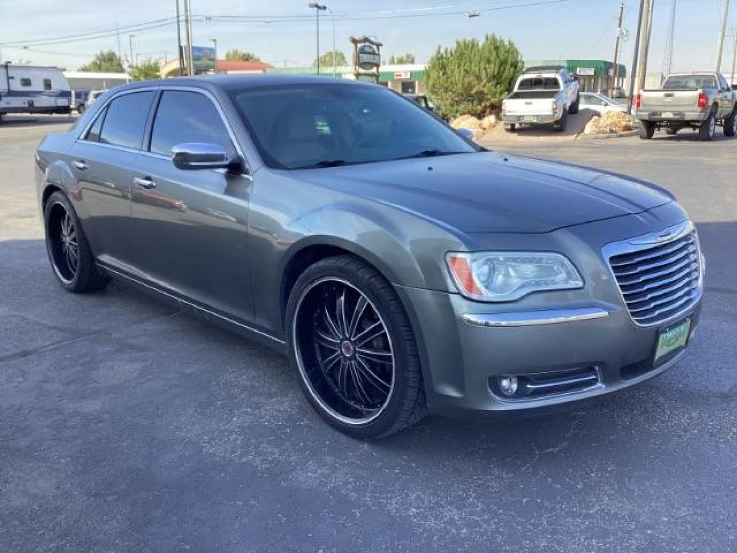 2012 Tungsten Metallic Chrysler 300 Limited RWD (2C3CCACG9CH) with an 3.6L V6 SOHC 24V engine, located at 1235 N Woodruff Ave., Idaho Falls, 83401, (208) 523-1053, 43.507172, -112.000488 - Photo#6