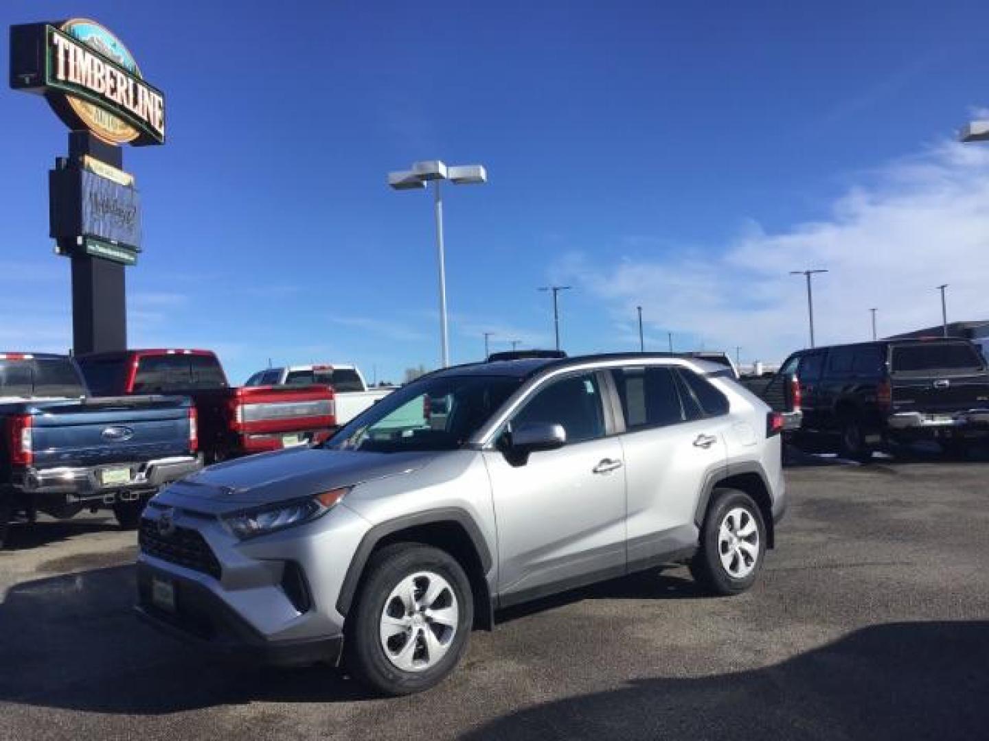 2021 Silver Sky Metallic /Black, cloth Toyota RAV4 LE AWD (2T3G1RFV9MC) with an 2.5L L4 DOHC 16V engine, 8-Speed Automatic transmission, located at 1235 N Woodruff Ave., Idaho Falls, 83401, (208) 523-1053, 43.507172, -112.000488 - This 2021 Toyota Rav4 LE, is AWD, has the 2.5L 4cyl. motor. It has 62,356 miles. Comes with cloth interior, back up camera, lane assist, blind spot, blue tooth and power locks and windows. At Timberline Auto it is always easy to find a great deal on your next vehicle! Our experienced sales staff can - Photo#0