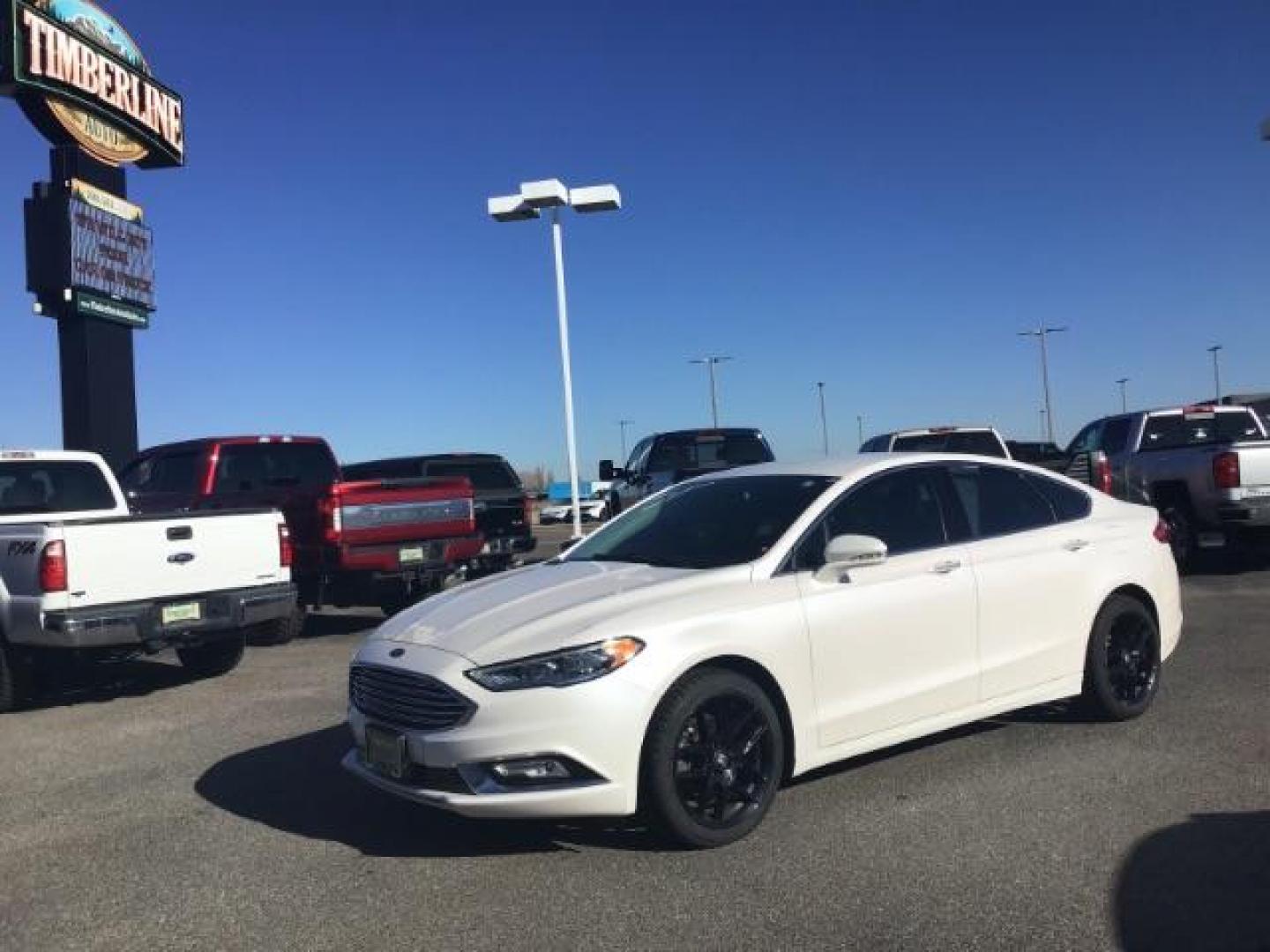 2017 Oxford White Clearcoat /Medium Light Stone, leather Ford Fusion SE (3FA6P0H93HR) with an 2.0L L4 DOHC 16V engine, 6-Speed Automatic transmission, located at 1235 N Woodruff Ave., Idaho Falls, 83401, (208) 523-1053, 43.507172, -112.000488 - This 2017 Ford Fusion SE, has the 4cyl. motor. It comes with leather seats, push button start, heated seats, power locks, power windows, and power seats. At Timberline Auto it is always easy to find a great deal on your next vehicle! Our experienced sales staff can help find the right vehicle that w - Photo#0