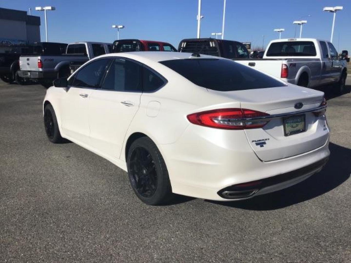 2017 Oxford White Clearcoat /Medium Light Stone, leather Ford Fusion SE (3FA6P0H93HR) with an 2.0L L4 DOHC 16V engine, 6-Speed Automatic transmission, located at 1235 N Woodruff Ave., Idaho Falls, 83401, (208) 523-1053, 43.507172, -112.000488 - This 2017 Ford Fusion SE, has the 4cyl. motor. It comes with leather seats, push button start, heated seats, power locks, power windows, and power seats. At Timberline Auto it is always easy to find a great deal on your next vehicle! Our experienced sales staff can help find the right vehicle that w - Photo#2