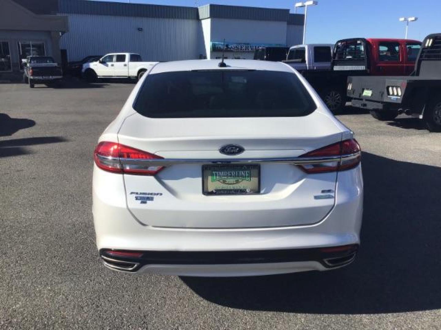 2017 Oxford White Clearcoat /Medium Light Stone, leather Ford Fusion SE (3FA6P0H93HR) with an 2.0L L4 DOHC 16V engine, 6-Speed Automatic transmission, located at 1235 N Woodruff Ave., Idaho Falls, 83401, (208) 523-1053, 43.507172, -112.000488 - This 2017 Ford Fusion SE, has the 4cyl. motor. It comes with leather seats, push button start, heated seats, power locks, power windows, and power seats. At Timberline Auto it is always easy to find a great deal on your next vehicle! Our experienced sales staff can help find the right vehicle that w - Photo#3