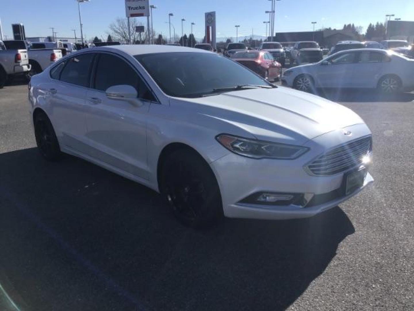 2017 Oxford White Clearcoat /Medium Light Stone, leather Ford Fusion SE (3FA6P0H93HR) with an 2.0L L4 DOHC 16V engine, 6-Speed Automatic transmission, located at 1235 N Woodruff Ave., Idaho Falls, 83401, (208) 523-1053, 43.507172, -112.000488 - This 2017 Ford Fusion SE, has the 4cyl. motor. It comes with leather seats, push button start, heated seats, power locks, power windows, and power seats. At Timberline Auto it is always easy to find a great deal on your next vehicle! Our experienced sales staff can help find the right vehicle that w - Photo#6