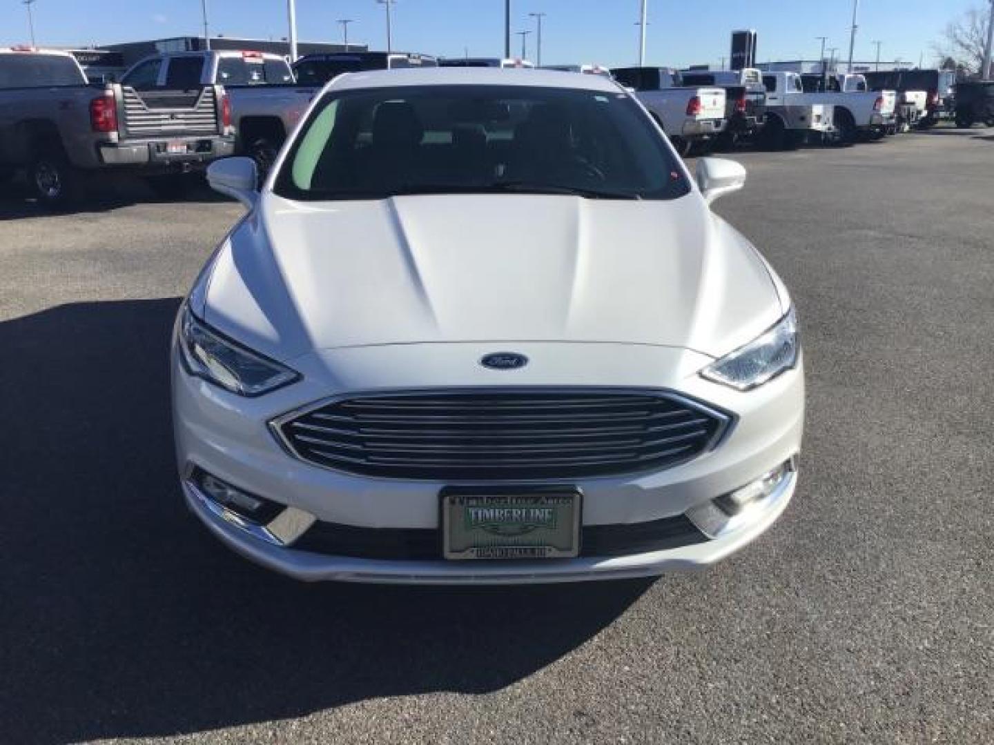 2017 Oxford White Clearcoat /Medium Light Stone, leather Ford Fusion SE (3FA6P0H93HR) with an 2.0L L4 DOHC 16V engine, 6-Speed Automatic transmission, located at 1235 N Woodruff Ave., Idaho Falls, 83401, (208) 523-1053, 43.507172, -112.000488 - This 2017 Ford Fusion SE, has the 4cyl. motor. It comes with leather seats, push button start, heated seats, power locks, power windows, and power seats. At Timberline Auto it is always easy to find a great deal on your next vehicle! Our experienced sales staff can help find the right vehicle that w - Photo#7