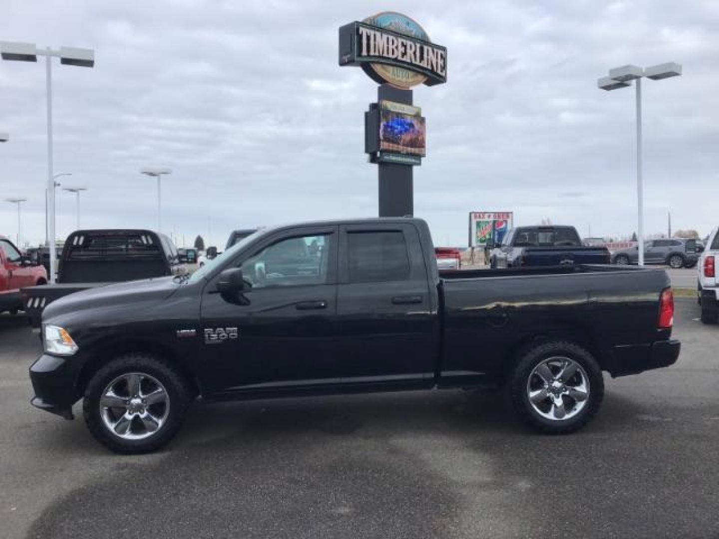 2019 Brilliant Black Crystal Pearl Coat /Black/Diesel Gray, cloth RAM 1500 Classic Tradesman Quad Cab 4WD (1C6RR7FTXKS) with an 5.7L V8 OHV 16V engine, 8-Speed Automatic transmission, located at 1235 N Woodruff Ave., Idaho Falls, 83401, (208) 523-1053, 43.507172, -112.000488 - This 2019 Ram 1500 Classic, has the 5.7L V8 Hemi motor. It has 70,799 miles. It comes with cloth interior, back up camera, blue tooth, power windows and power locks. At Timberline Auto it is always easy to find a great deal on your next vehicle! Our experienced sales staff can help find the right ve - Photo#0