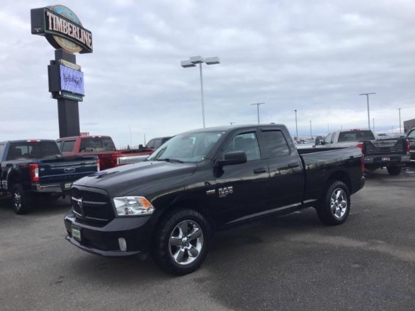 2019 Brilliant Black Crystal Pearl Coat /Black/Diesel Gray, cloth RAM 1500 Classic Tradesman Quad Cab 4WD (1C6RR7FTXKS) with an 5.7L V8 OHV 16V engine, 8-Speed Automatic transmission, located at 1235 N Woodruff Ave., Idaho Falls, 83401, (208) 523-1053, 43.507172, -112.000488 - This 2019 Ram 1500 Classic, has the 5.7L V8 Hemi motor. It has 70,799 miles. It comes with cloth interior, back up camera, blue tooth, power windows and power locks. At Timberline Auto it is always easy to find a great deal on your next vehicle! Our experienced sales staff can help find the right ve - Photo#1