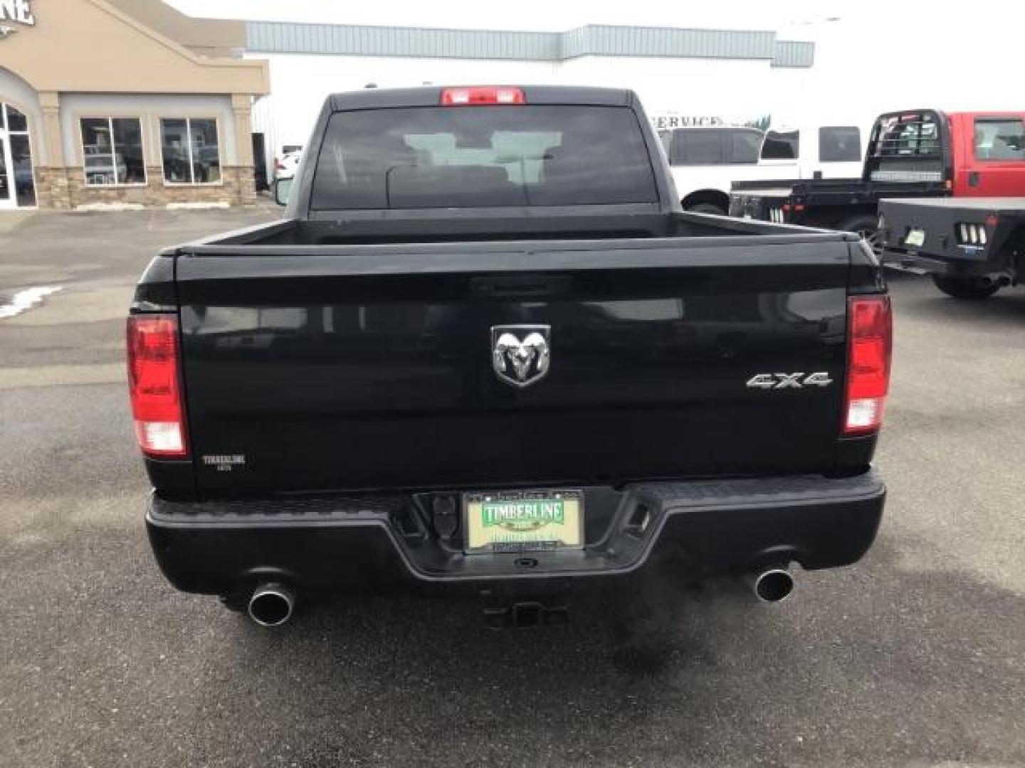 2019 Brilliant Black Crystal Pearl Coat /Black/Diesel Gray, cloth RAM 1500 Classic Tradesman Quad Cab 4WD (1C6RR7FTXKS) with an 5.7L V8 OHV 16V engine, 8-Speed Automatic transmission, located at 1235 N Woodruff Ave., Idaho Falls, 83401, (208) 523-1053, 43.507172, -112.000488 - This 2019 Ram 1500 Classic, has the 5.7L V8 Hemi motor. It has 70,799 miles. It comes with cloth interior, back up camera, blue tooth, power windows and power locks. At Timberline Auto it is always easy to find a great deal on your next vehicle! Our experienced sales staff can help find the right ve - Photo#3