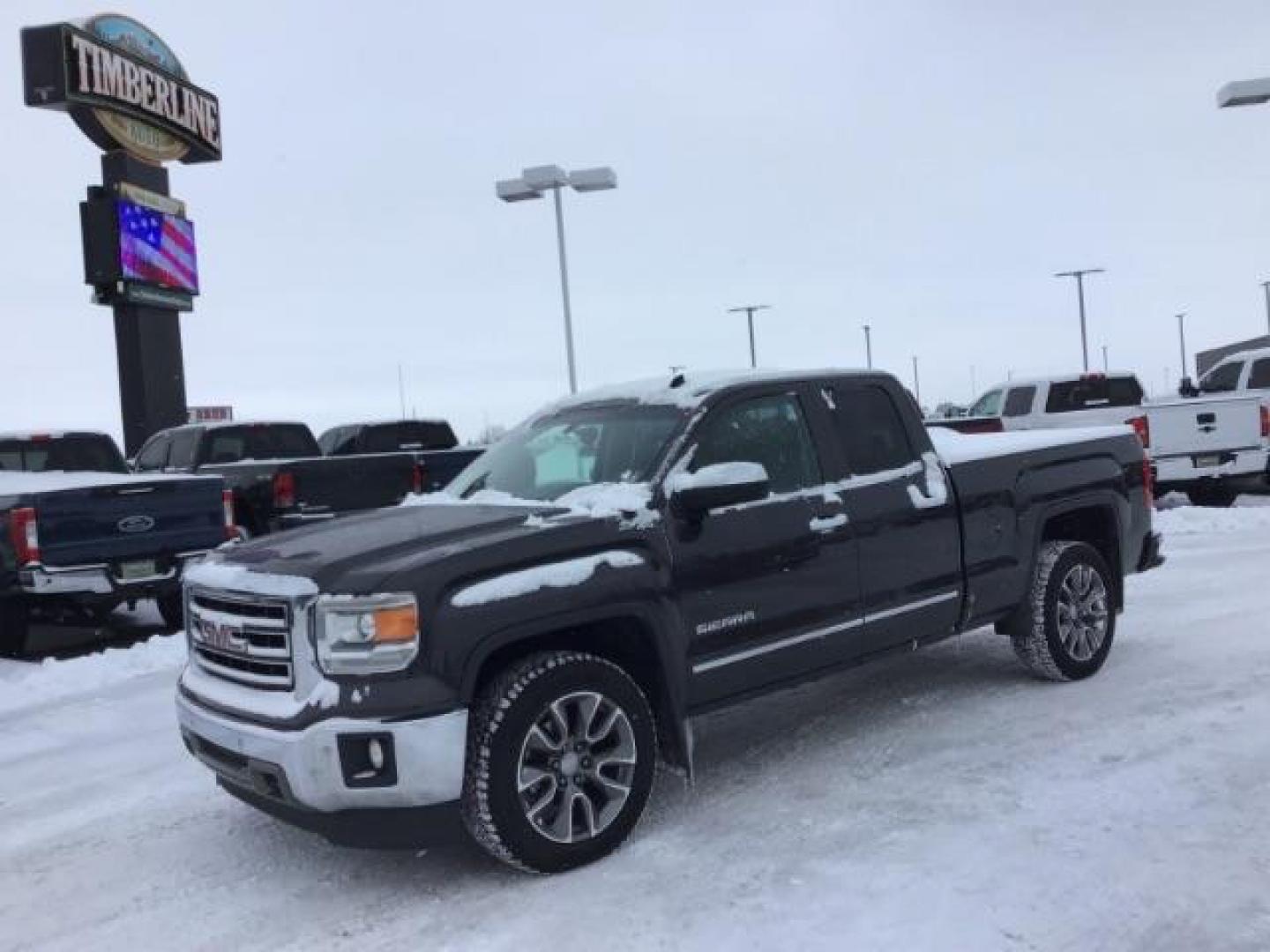 2015 Onyx Black /Jet Black, leather GMC Sierra 1500 SLT Double Cab 4WD (1GTV2VEC6FZ) with an 5.3L V8 OHV 16V engine, 6-Speed Automatic transmission, located at 1235 N Woodruff Ave., Idaho Falls, 83401, (208) 523-1053, 43.507172, -112.000488 - This 2015 GMC 1500 4x4 SLT, has the 5.3L motor. It has 114,000 miles. Comes with leather interior, heated and cooled seats, touch screen stereo, blue tooth audio, and remote start. At Timberline Auto it is always easy to find a great deal on your next vehicle! Our experienced sales staff can help fi - Photo#0