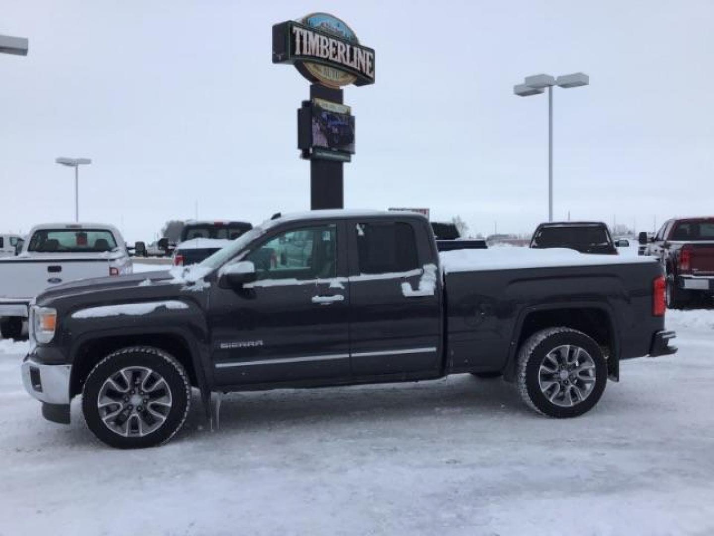 2015 Onyx Black /Jet Black, leather GMC Sierra 1500 SLT Double Cab 4WD (1GTV2VEC6FZ) with an 5.3L V8 OHV 16V engine, 6-Speed Automatic transmission, located at 1235 N Woodruff Ave., Idaho Falls, 83401, (208) 523-1053, 43.507172, -112.000488 - This 2015 GMC 1500 4x4 SLT, has the 5.3L motor. It has 114,000 miles. Comes with leather interior, heated and cooled seats, touch screen stereo, blue tooth audio, and remote start. At Timberline Auto it is always easy to find a great deal on your next vehicle! Our experienced sales staff can help fi - Photo#1