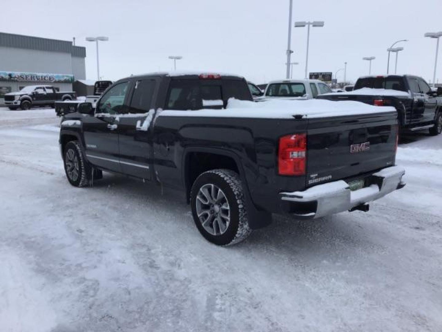 2015 Onyx Black /Jet Black, leather GMC Sierra 1500 SLT Double Cab 4WD (1GTV2VEC6FZ) with an 5.3L V8 OHV 16V engine, 6-Speed Automatic transmission, located at 1235 N Woodruff Ave., Idaho Falls, 83401, (208) 523-1053, 43.507172, -112.000488 - This 2015 GMC 1500 4x4 SLT, has the 5.3L motor. It has 114,000 miles. Comes with leather interior, heated and cooled seats, touch screen stereo, blue tooth audio, and remote start. At Timberline Auto it is always easy to find a great deal on your next vehicle! Our experienced sales staff can help fi - Photo#2