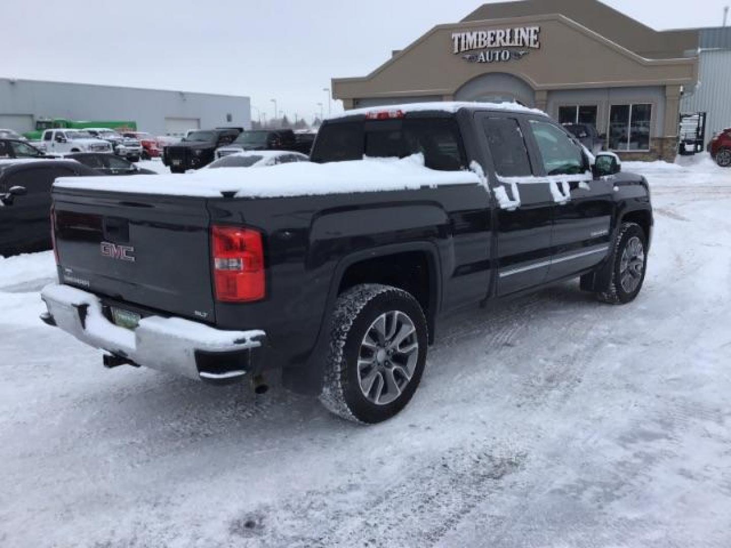 2015 Onyx Black /Jet Black, leather GMC Sierra 1500 SLT Double Cab 4WD (1GTV2VEC6FZ) with an 5.3L V8 OHV 16V engine, 6-Speed Automatic transmission, located at 1235 N Woodruff Ave., Idaho Falls, 83401, (208) 523-1053, 43.507172, -112.000488 - This 2015 GMC 1500 4x4 SLT, has the 5.3L motor. It has 114,000 miles. Comes with leather interior, heated and cooled seats, touch screen stereo, blue tooth audio, and remote start. At Timberline Auto it is always easy to find a great deal on your next vehicle! Our experienced sales staff can help fi - Photo#4