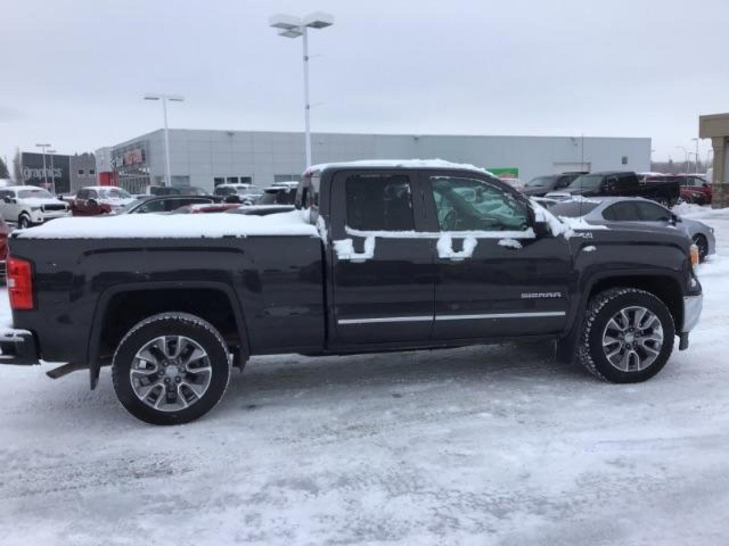 2015 Onyx Black /Jet Black, leather GMC Sierra 1500 SLT Double Cab 4WD (1GTV2VEC6FZ) with an 5.3L V8 OHV 16V engine, 6-Speed Automatic transmission, located at 1235 N Woodruff Ave., Idaho Falls, 83401, (208) 523-1053, 43.507172, -112.000488 - This 2015 GMC 1500 4x4 SLT, has the 5.3L motor. It has 114,000 miles. Comes with leather interior, heated and cooled seats, touch screen stereo, blue tooth audio, and remote start. At Timberline Auto it is always easy to find a great deal on your next vehicle! Our experienced sales staff can help fi - Photo#5