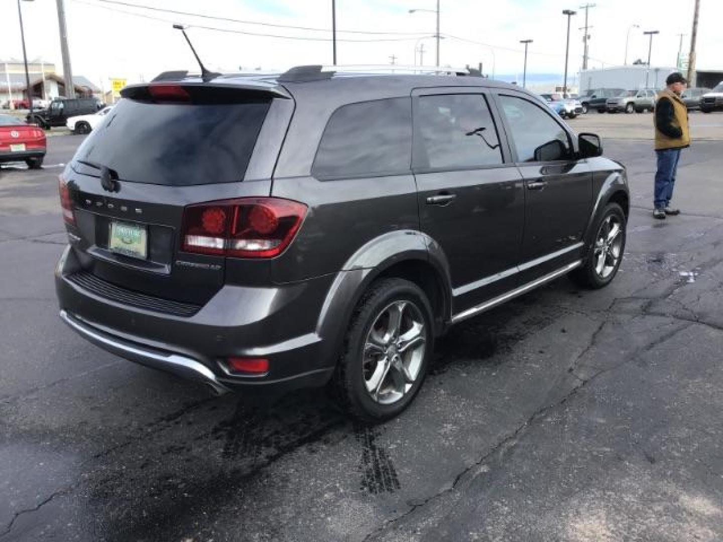 2016 Granite Crystal Metallic Clear Coat /Black, leather/cloth Dodge Journey Crossroad AWD (3C4PDDGG8GT) with an 3.6L V6 DOHC 24V engine, 6-Speed Automatic transmission, located at 1235 N Woodruff Ave., Idaho Falls, 83401, (208) 523-1053, 43.507172, -112.000488 - At Timberline Auto it is always easy to find a great deal on your next vehicle! Our experienced sales staff can help find the right vehicle will fit your needs. Our knowledgeable finance department has options for almost any credit score. We offer many warranty contract options to protect you new pr - Photo#4