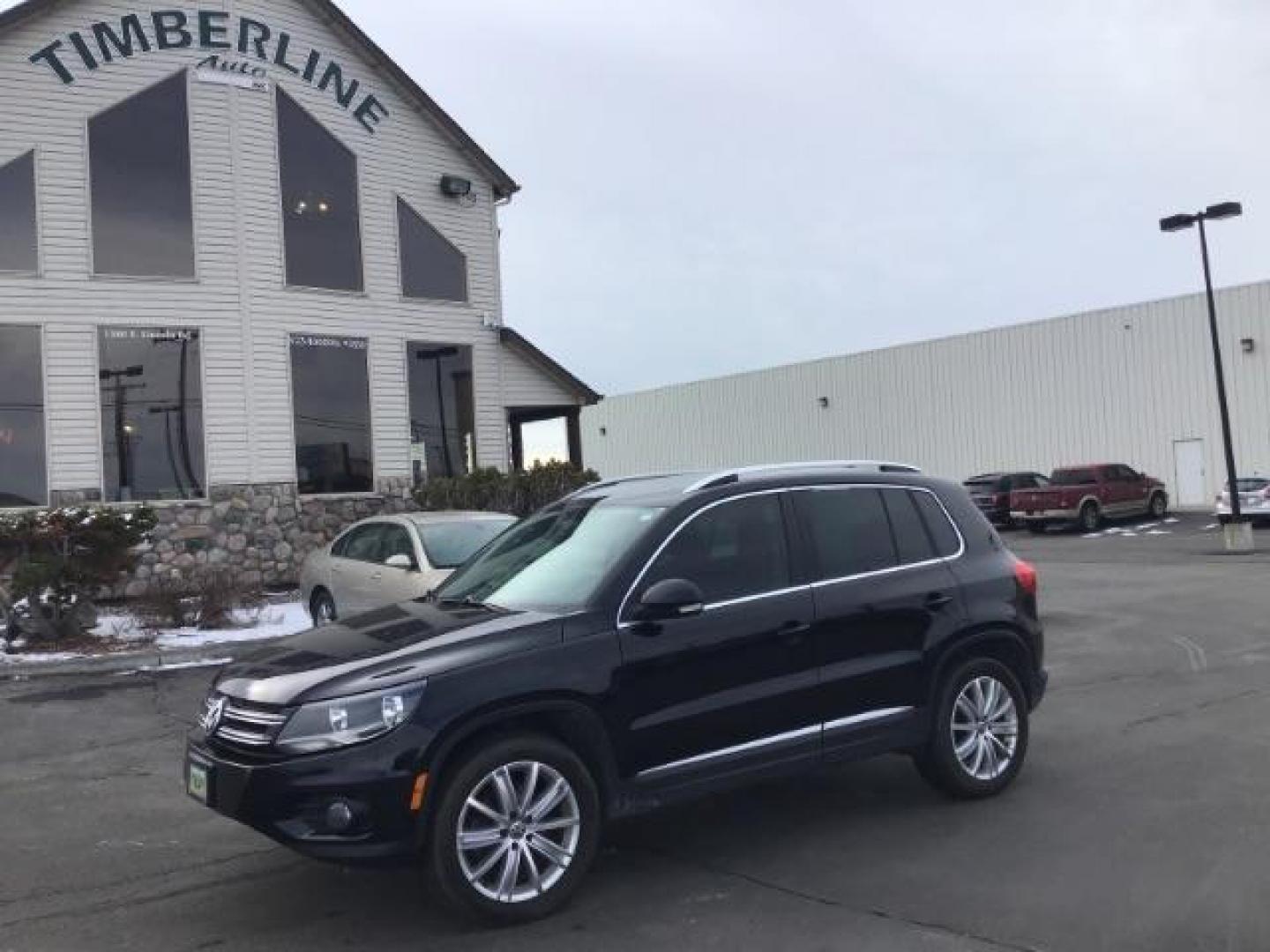 2013 Deep Black Metallic /Black Volkswagen Tiguan 2.0T S 4Motion (WVGBV7AX5DW) with an 2.0L L4 DOHC 16V TURBO engine, 6-Speed Automatic transmission, located at 1235 N Woodruff Ave., Idaho Falls, 83401, (208) 523-1053, 43.507172, -112.000488 - This 2013 Volkswagen Tiguan, has the 2.0T motor. It only has 95,000 miles. It comes with leather interior, heated seats, blue tooth audio, touch screen stereo, and cruise control. At Timberline Auto it is always easy to find a great deal on your next vehicle! Our experienced sales staff can help fin - Photo#0