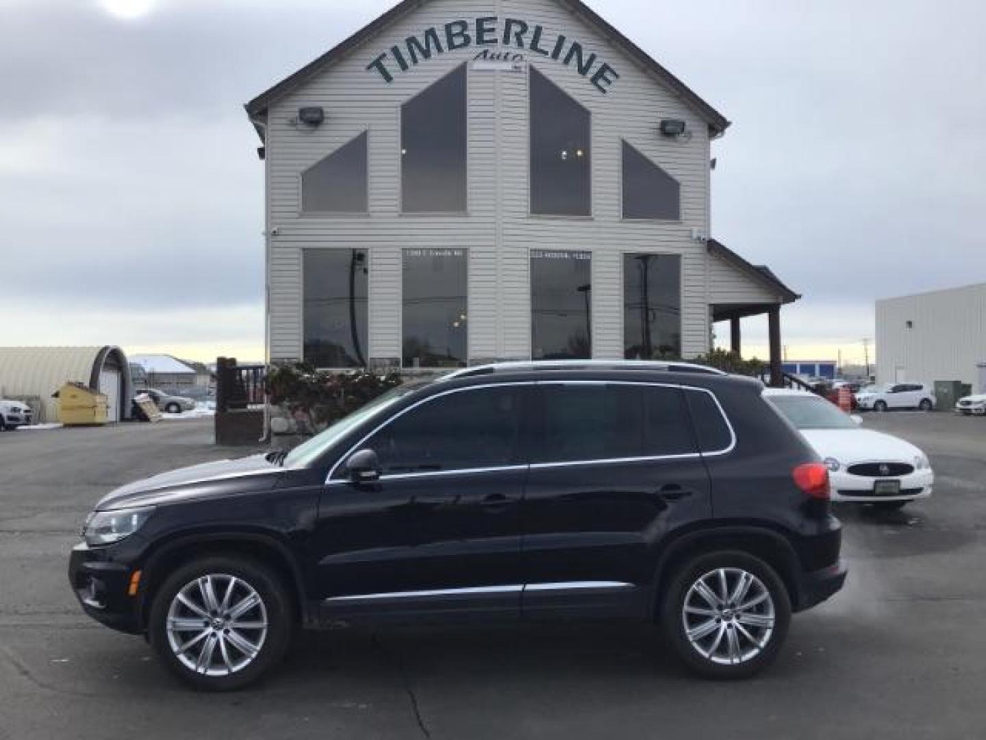 2013 Deep Black Metallic /Black Volkswagen Tiguan 2.0T S 4Motion (WVGBV7AX5DW) with an 2.0L L4 DOHC 16V TURBO engine, 6-Speed Automatic transmission, located at 1235 N Woodruff Ave., Idaho Falls, 83401, (208) 523-1053, 43.507172, -112.000488 - This 2013 Volkswagen Tiguan, has the 2.0T motor. It only has 95,000 miles. It comes with leather interior, heated seats, blue tooth audio, touch screen stereo, and cruise control. At Timberline Auto it is always easy to find a great deal on your next vehicle! Our experienced sales staff can help fin - Photo#1