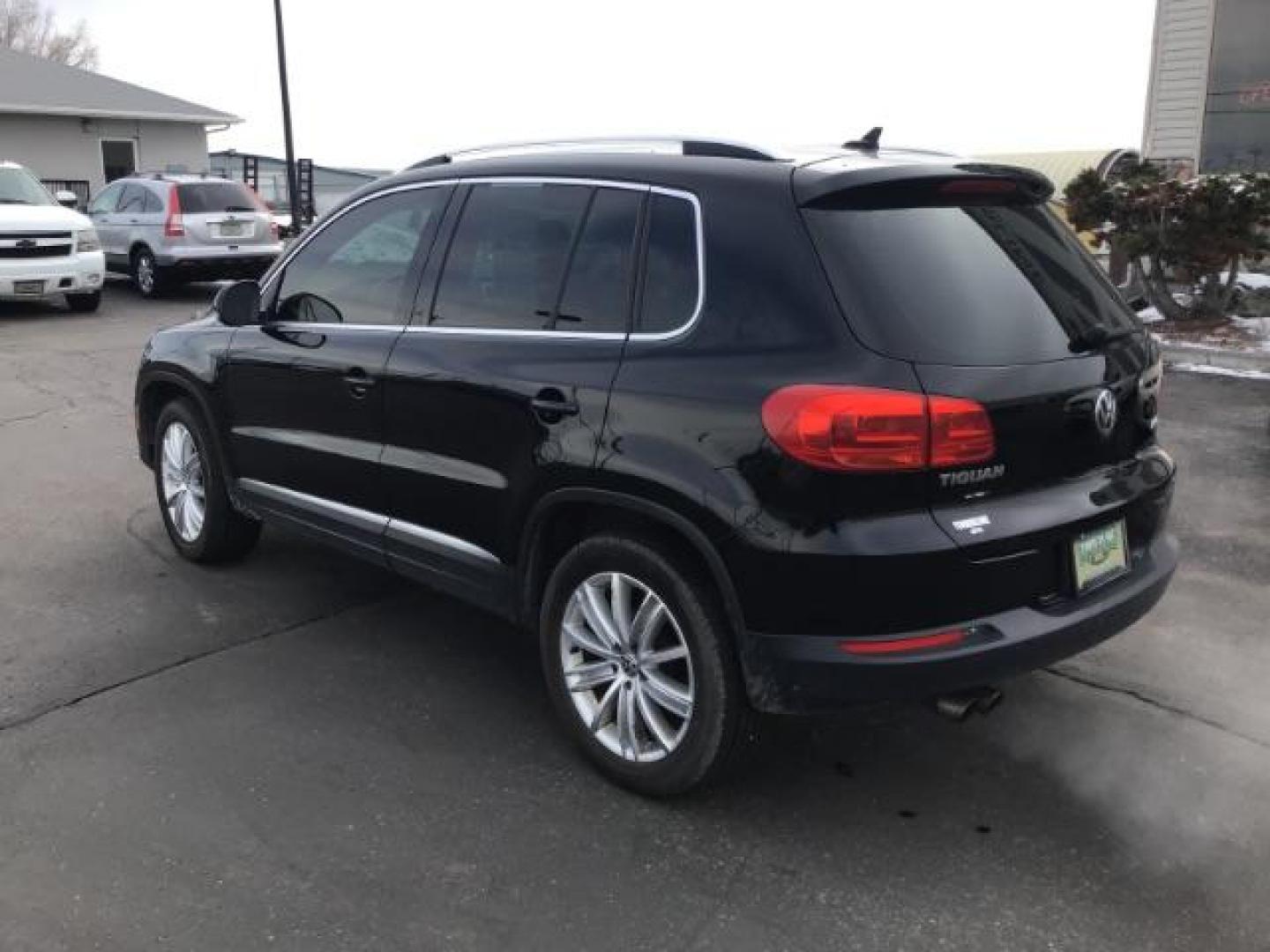 2013 Deep Black Metallic /Black Volkswagen Tiguan 2.0T S 4Motion (WVGBV7AX5DW) with an 2.0L L4 DOHC 16V TURBO engine, 6-Speed Automatic transmission, located at 1235 N Woodruff Ave., Idaho Falls, 83401, (208) 523-1053, 43.507172, -112.000488 - This 2013 Volkswagen Tiguan, has the 2.0T motor. It only has 95,000 miles. It comes with leather interior, heated seats, blue tooth audio, touch screen stereo, and cruise control. At Timberline Auto it is always easy to find a great deal on your next vehicle! Our experienced sales staff can help fin - Photo#2